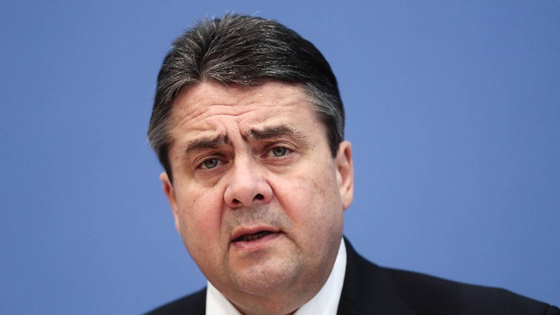 German Vice Chancellor and Minister for Economy and Energy Sigmar Gabriel attends a news conference to present the annual German economic report with the government's economy projection in Berlin, Wednesday, Jan. 28, 2015. (AP Photo/Markus Schreiber)