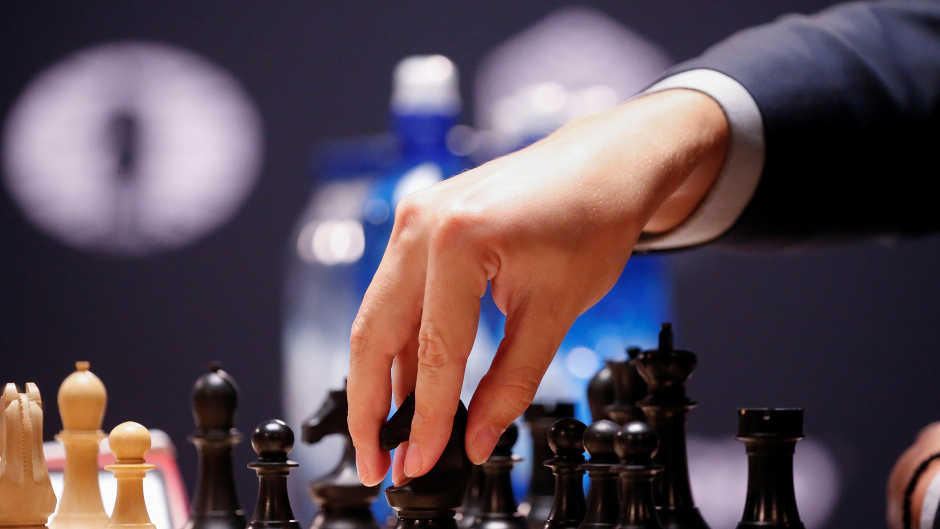 File photo: Sergey Karjakin, of Russia, makes a mover during his match with Magnus Carlsen, of Norway, in the fifth round of the 2016 World Chess Championship in New York U.S., November 17, 2016. (REUTERS/Shannon Stapleton)