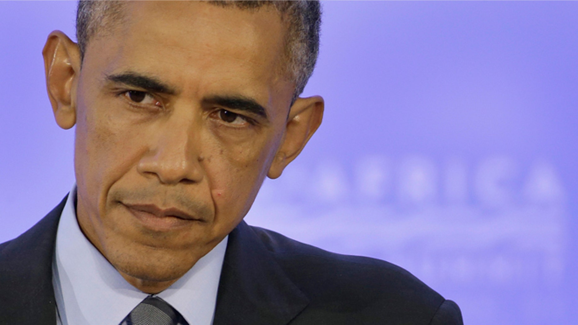 President Barack Obama listens to a question during a news conference at the U.S. Africa Leaders Summit in Washington, Wednesday, Aug. 6, 2014. (AP Photo/Jacquelyn Martin)