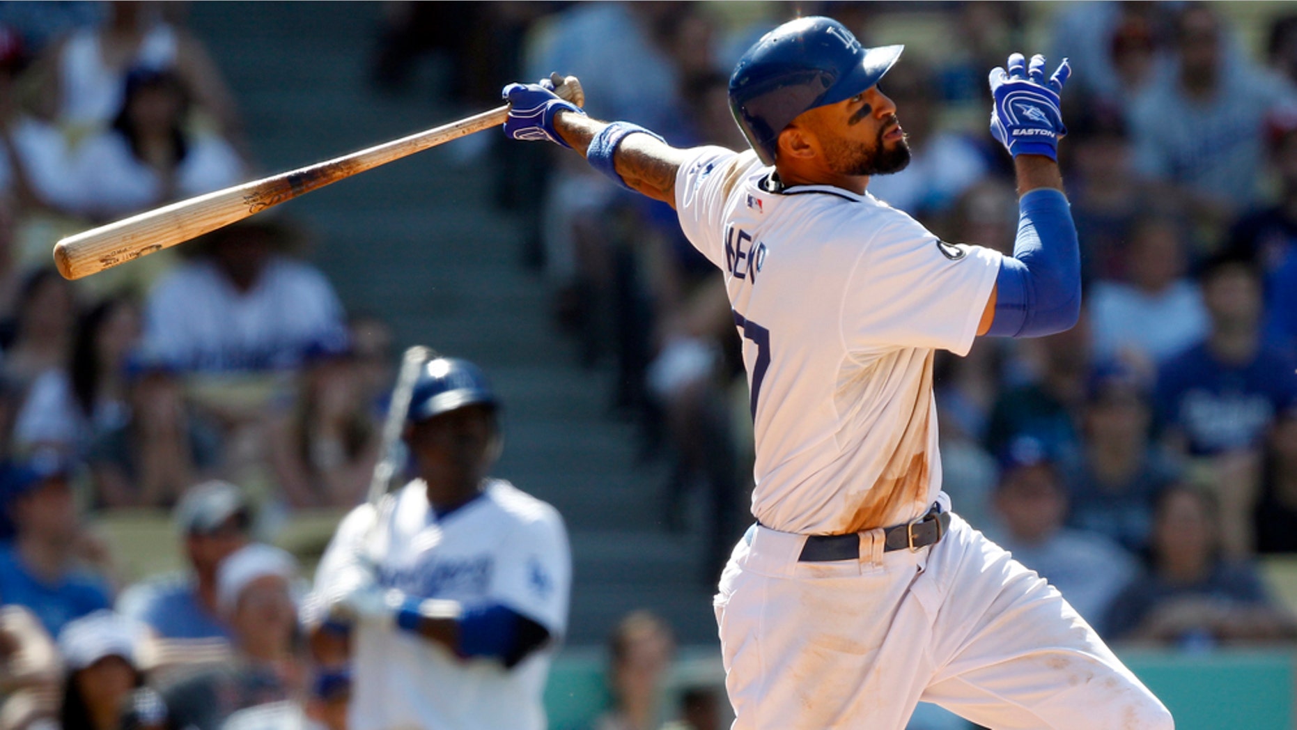 Los Angeles Dodgers' Matt Kemp hits a game winning two-run home run to beat the St. Louis Cardinals during the ninth inning of a baseball game in Los Angeles, Sunday, April 17, 2011. Dodgers won the game 2-1. (AP Photo/Alex Gallardo)