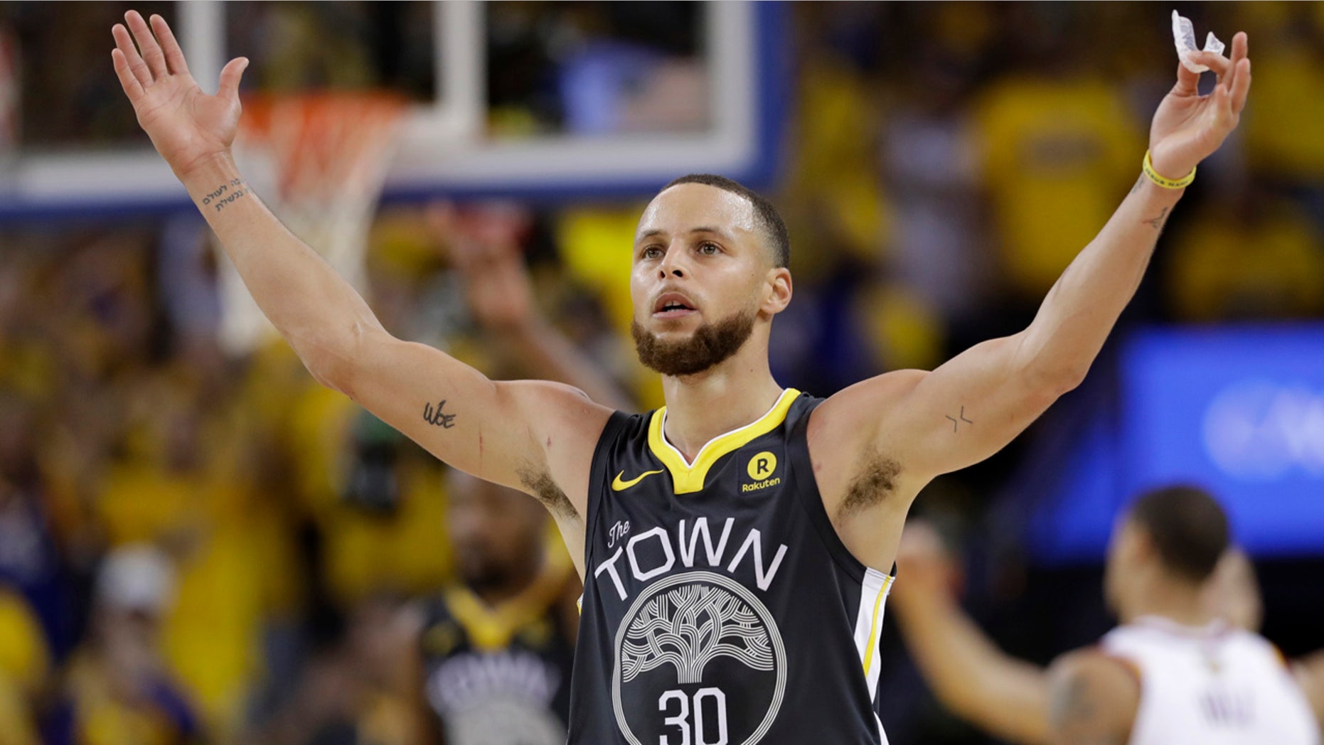 June 3: Golden State Warriors guard Stephen Curry (30) celebrates during the second half of Game 2.