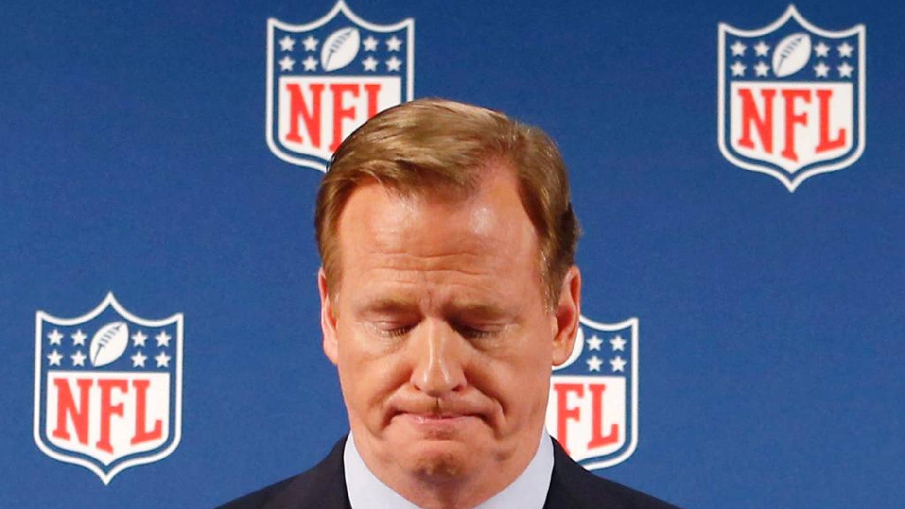 FILE - In this Sept. 19, 2014, file photo, NFL Commissioner Roger Goodell pauses as he speaks during a news conference in New York. Rice has won the appeal of his indefinite suspension by the NFL, which has been "vacated immediately," the players' union said Friday, Nov. 28, 2014. (AP Photo/Jason DeCrow, File)