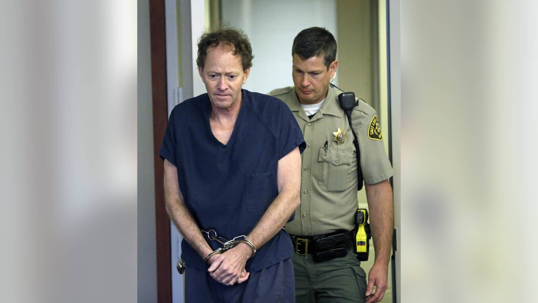 FILE - In this Friday, May 9, 2014, file photo, John Brickman Wall, a Salt Lake City pediatrician awaiting trial on murder in his ex-wife's death, appears in court, in Salt Lake City. Jury selection for Wall's trial is set for Tuesday, Feb. 17, 2015, with opening arguments set for Wednesday. The trial is expected to last four weeks. (AP Photo/Rick Bowmer, Pool, File)