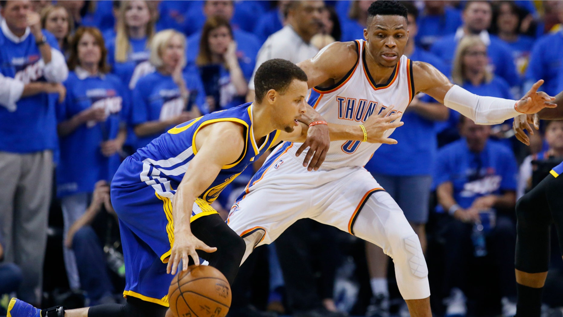 May 22, 2016: Golden State Warriors guard Stephen Curry (30) tries to drive around Oklahoma City Thunder guard Russell Westbrook (0) during the second half in Game 3 of the NBA Western Conference finals in Oklahoma City