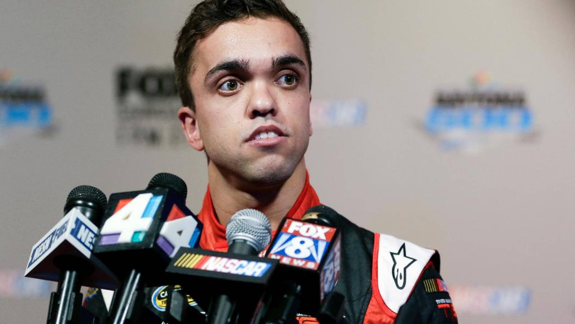 FILE - In this Feb. 16, 2016, file photo, truck series driver Rico Abreu answers questions from members of the media during NASCAR media day at Daytona International Speedwayin Daytona Beach, Fla. Abreu has roughly a dozen starts at Eldora Speedway, where the Truck Series races next week and Abreu likely has his best chance to qualify for NASCAR's playoffs. (AP Photo/John Raoux, File)