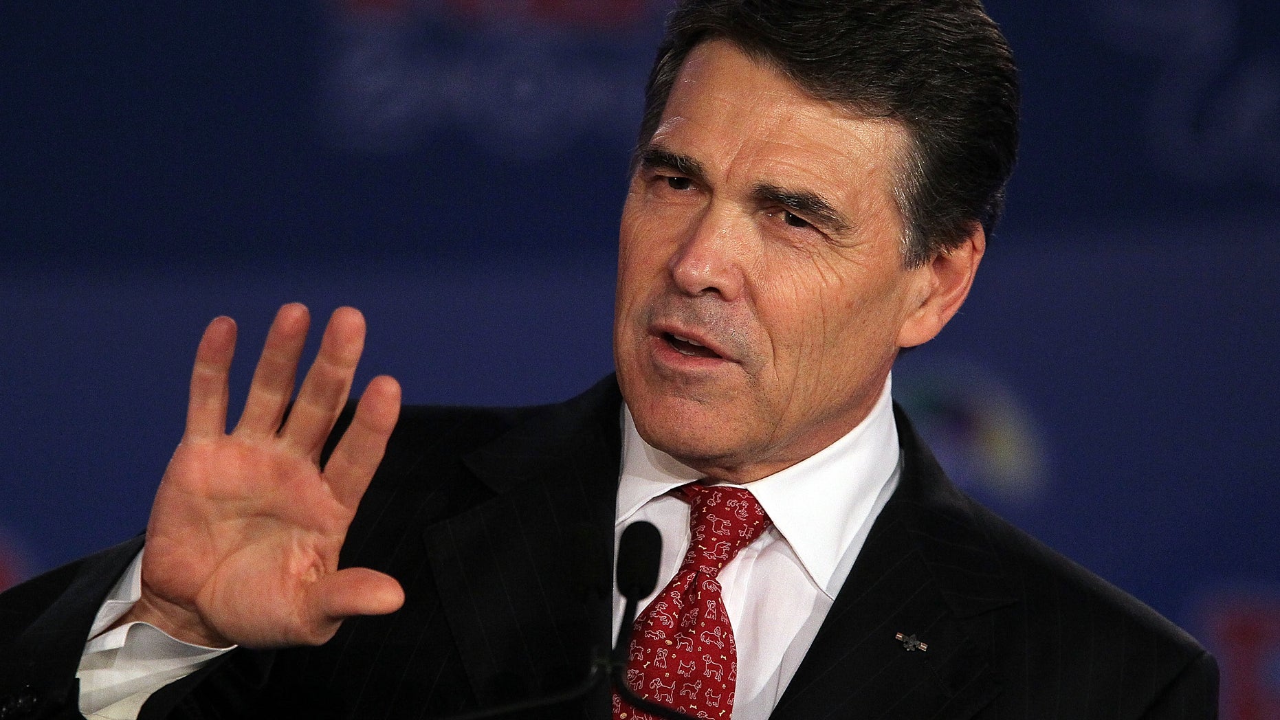 Texas Gov. Rick Perry, who is a presidential candidate, says he opposes building a fence along the U.S.-Mexican border, but supports a National Guard presence there.