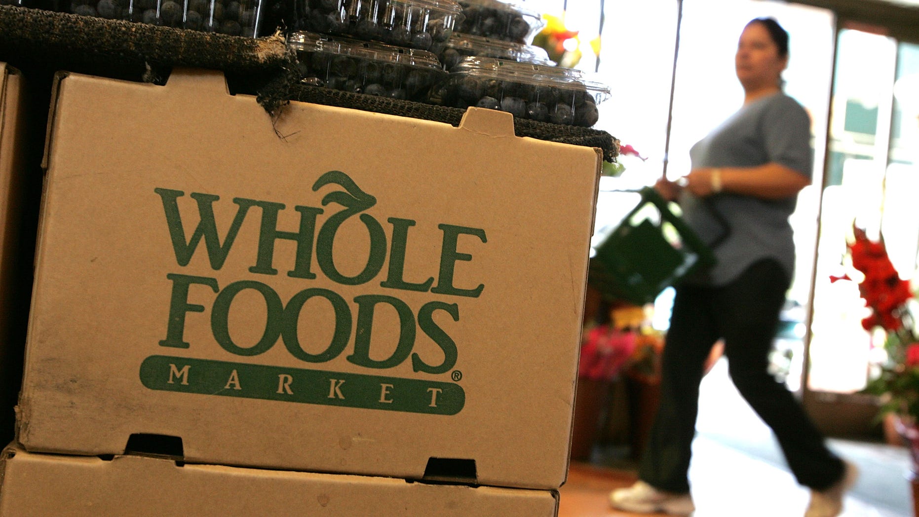 SAN FRANCISCO - FEBRUARY 22: The Whole Foods logo adorns a cardboard box at a Whole Foods Market February 22, 2007 in San Francisco, California. Whole Foods Market Inc. announced that it plans to purchase Wild Oats Market Inc. for an estimated $565 million in hopes of competing with larger food chains that have started to introduce organic and prepared foods to their inventories. (Photo by Justin Sullivan/Getty Images)