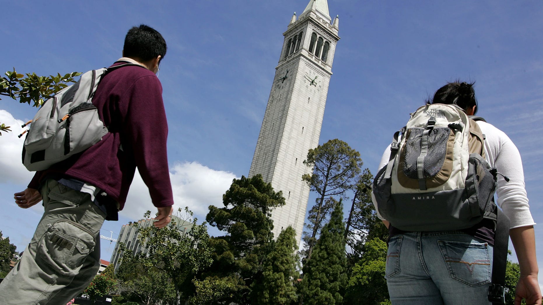 BERKELEY, CA - APRIL 17: UC Berkeley students walk by Sather Tower on the UC Berkeley campus April 17, 2007 in Berkeley, California. Robert Dynes, President of the University of California, said the University of California campuses across the state will reevaluate security and safety policies in the wake of the shooting massacre at Virginia Tech that left 33 people dead, including the gunman, 23 year-old student Cho Seung-Hui. (Photo by Justin Sullivan/Getty Images)