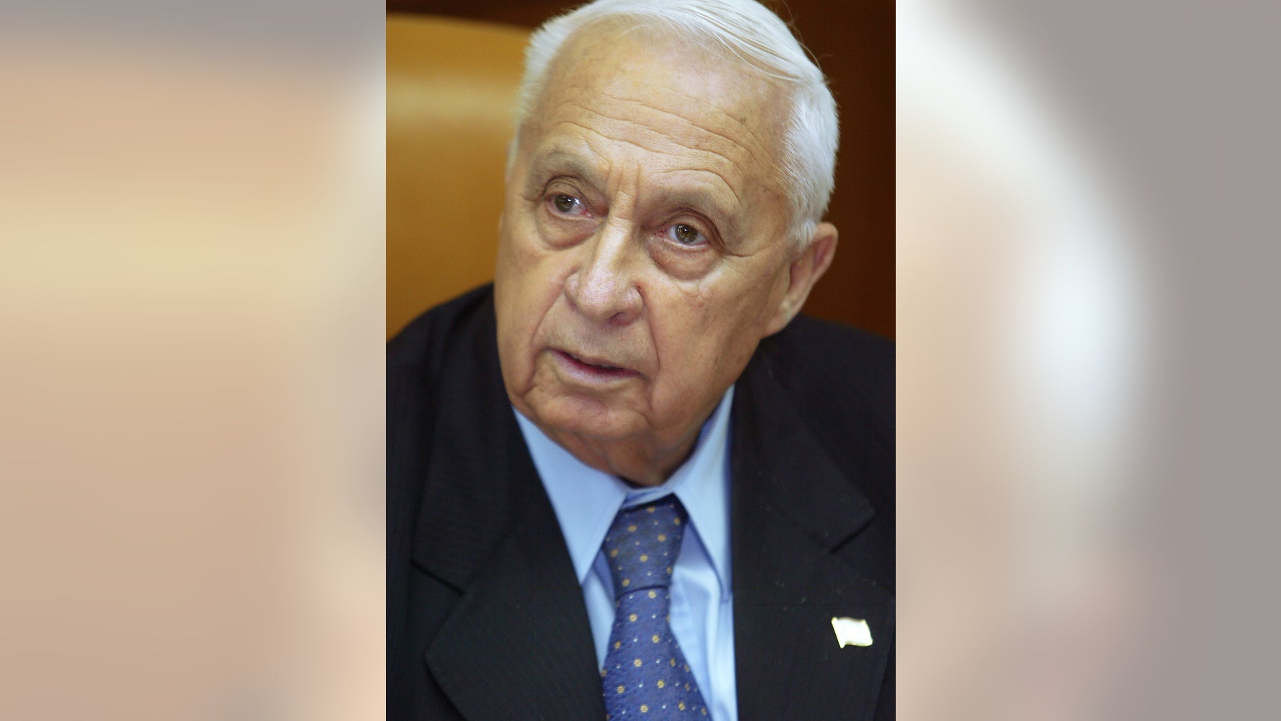 Jan. 24, 2005: In this file photo, Israeli Prime Minister Ariel Sharon is pictured at the start of a meeting at his office, in Jerusalem.