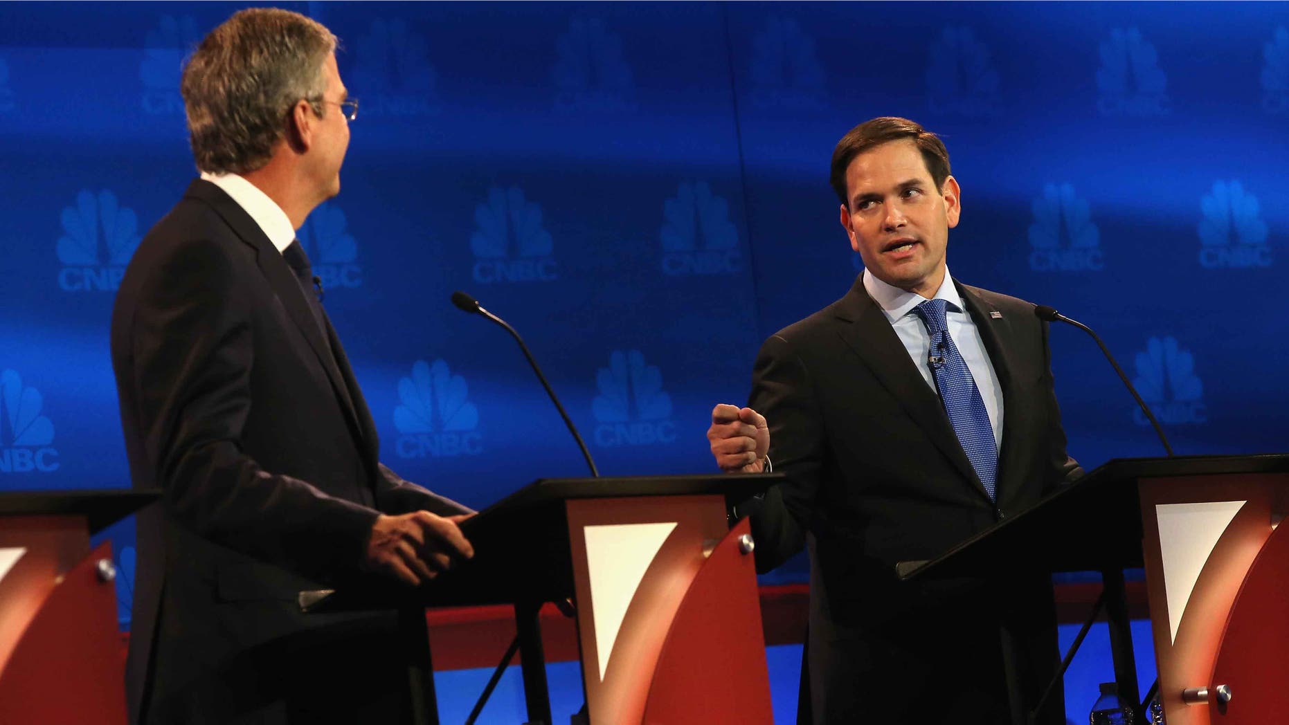 BOULDER, CO - OCTOBER 28: Presidential candidates Sen. Marco Rubio (R) (R-FL) speaks while Jeb Bush looks on during the CNBC Republican Presidential Debate at University of Colorados Coors Events Center October 28, 2015 in Boulder, Colorado. Fourteen Republican presidential candidates are participating in the third set of Republican presidential debates. (Photo by Justin Sullivan/Getty Images)
