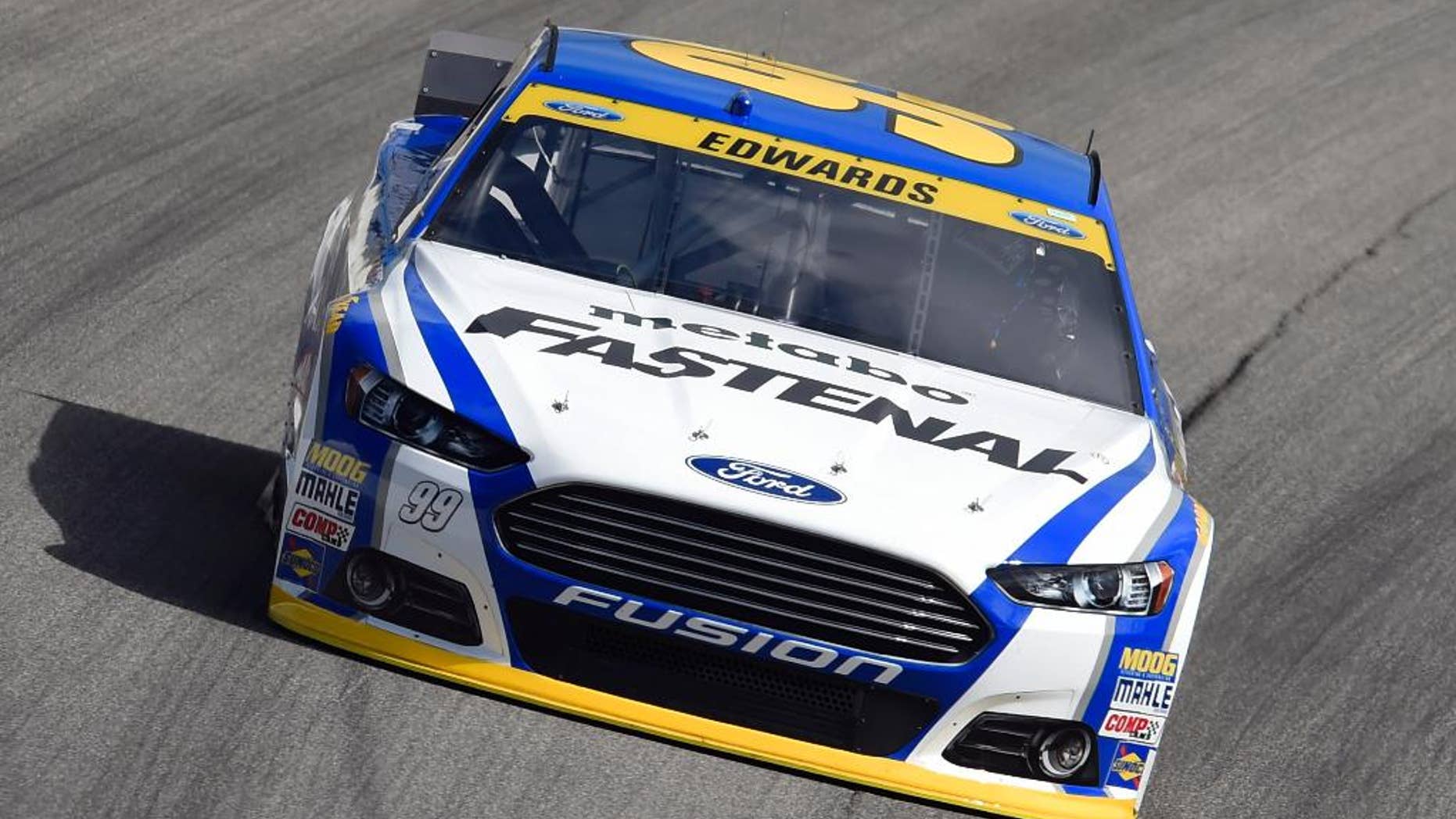 NASCAR driver Carl Edwards (99) drives during a practice for the NASCAR Sprint Cup Series auto race at Chicagoland Speedway in Joliet, Ill., Saturday, Sept. 13, 2014. (AP Photo/Paul J. Bergstrom)
