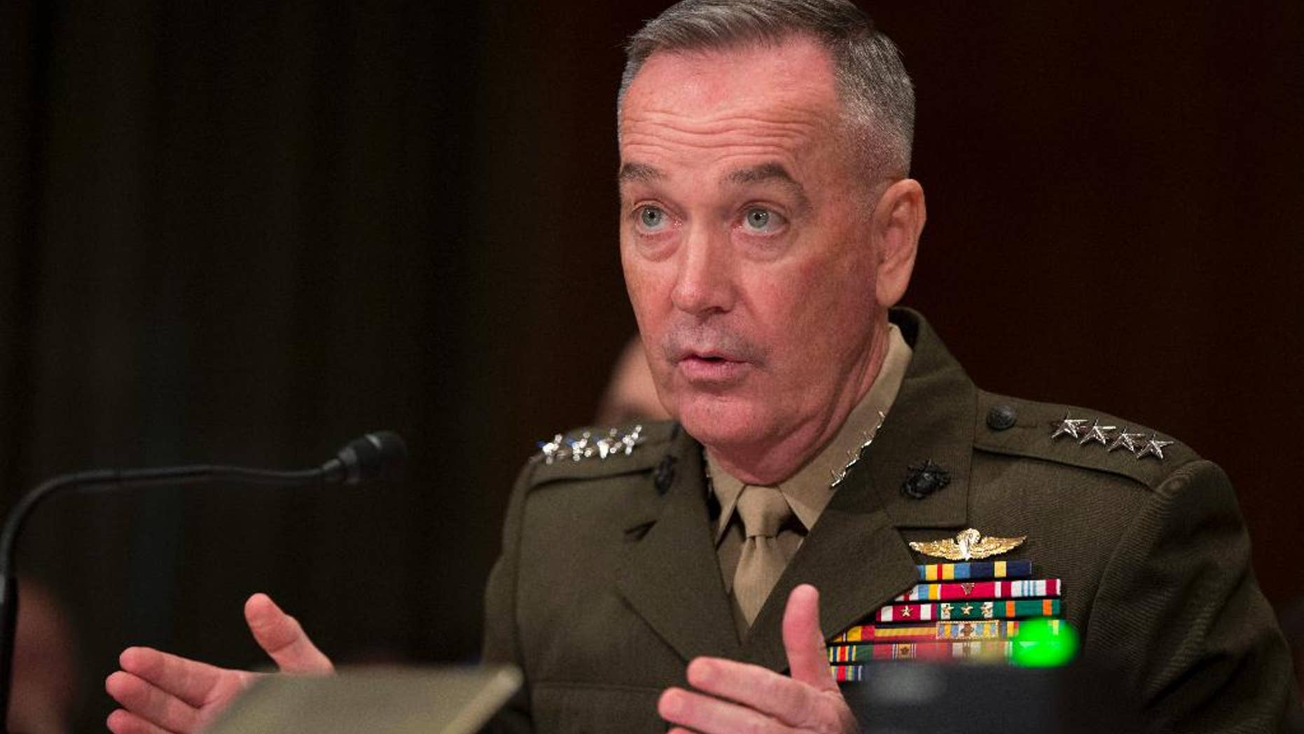 FILE - In this April 27, 2016 file photo, Joint Chiefs Chairman Gen. Joseph Dunford Jr. testifies on Capitol Hill in Washington. Dunford said Thursday, Feb. 23, 2017, a Pentagon-led review of strategy for defeating the Islamic State group will present President Donald Trump with options not just to speed up the fight against IS but also to combat al-Qaida and other extremist groups beyond Iraq and Syria. (AP Photo/Manuel Balce Ceneta, File)