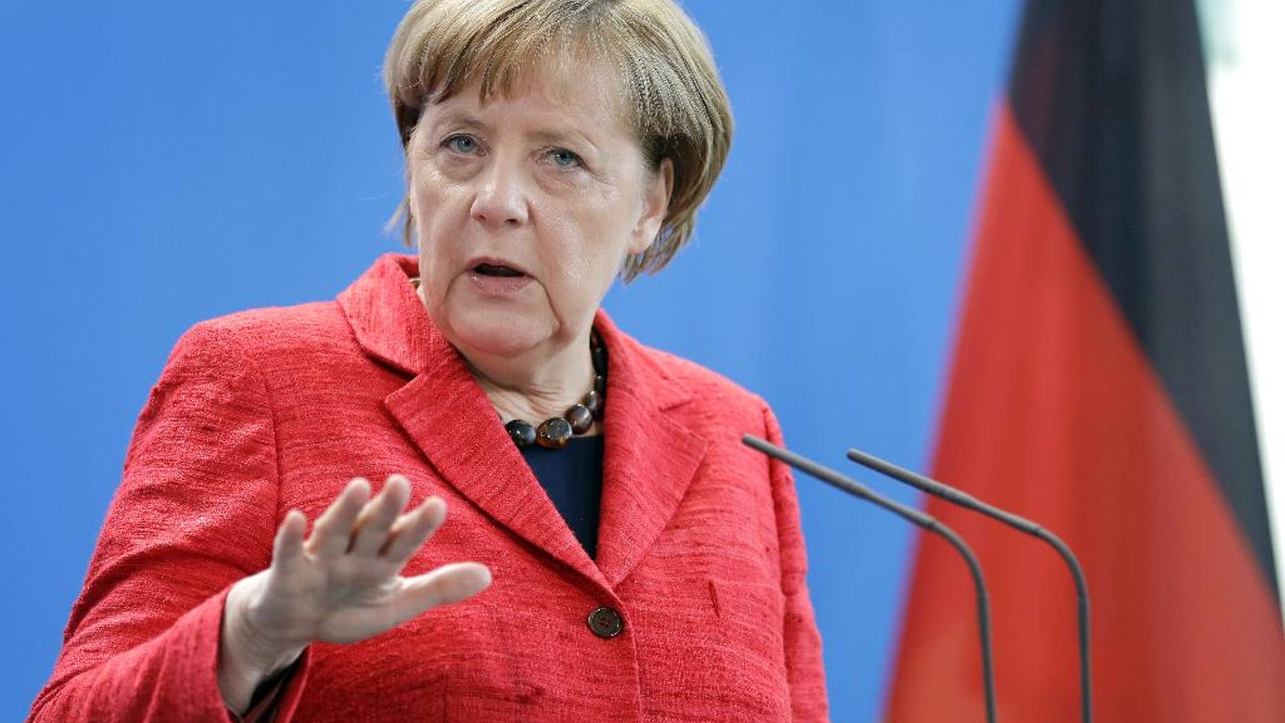 German Chancellor Angela Merkel addresses the media during a joint press conference as part of a meeting with NATO Secretary General Jens Stoltenberg at the chancellery in Berlin, Germany, Thursday, May 11, 2017. (AP Photo/Michael Sohn)