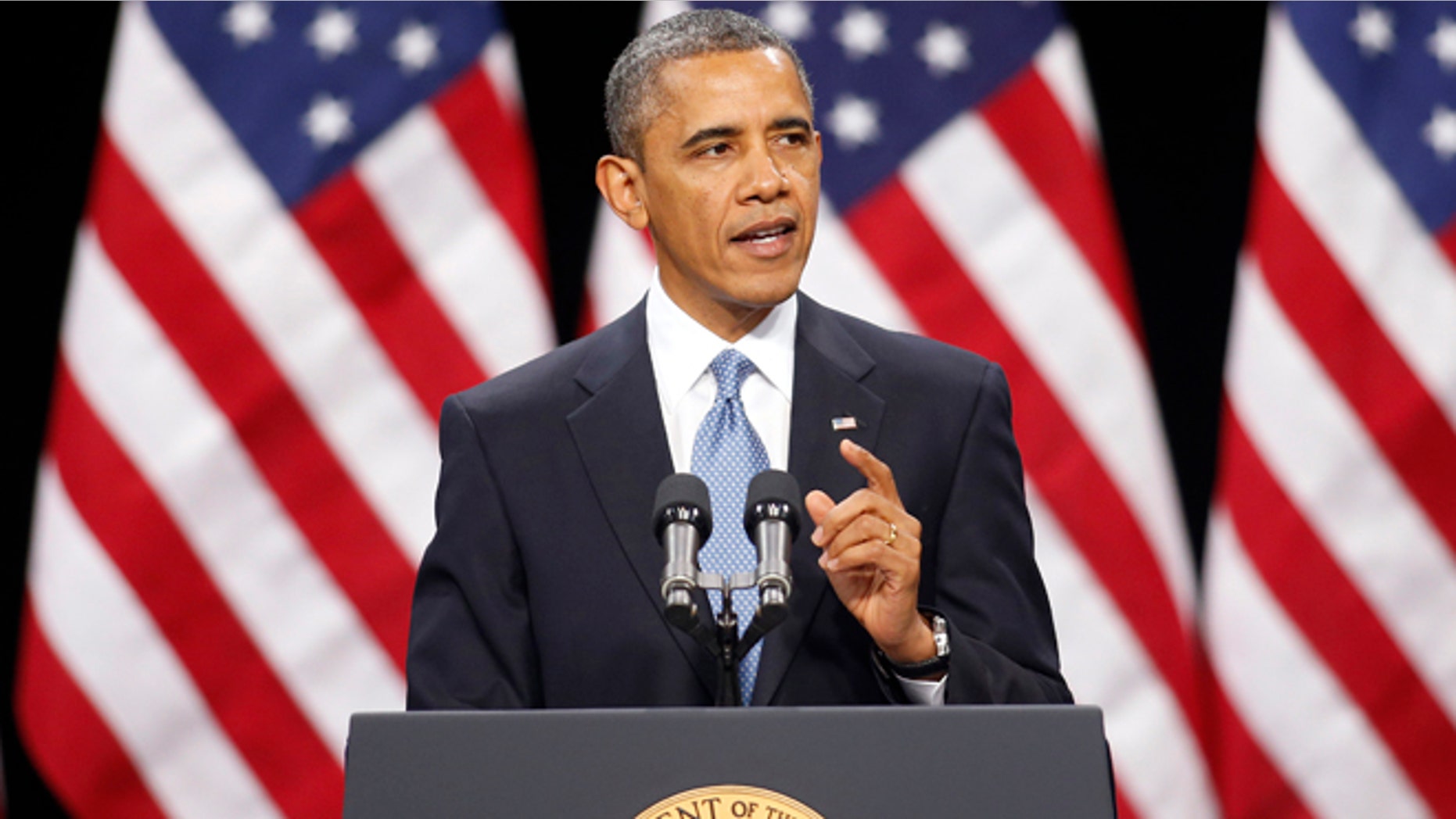 FILE - In this Jan. 29, 2013 file photo, President Barack Obama gestures as he speaks in Las Vegas.