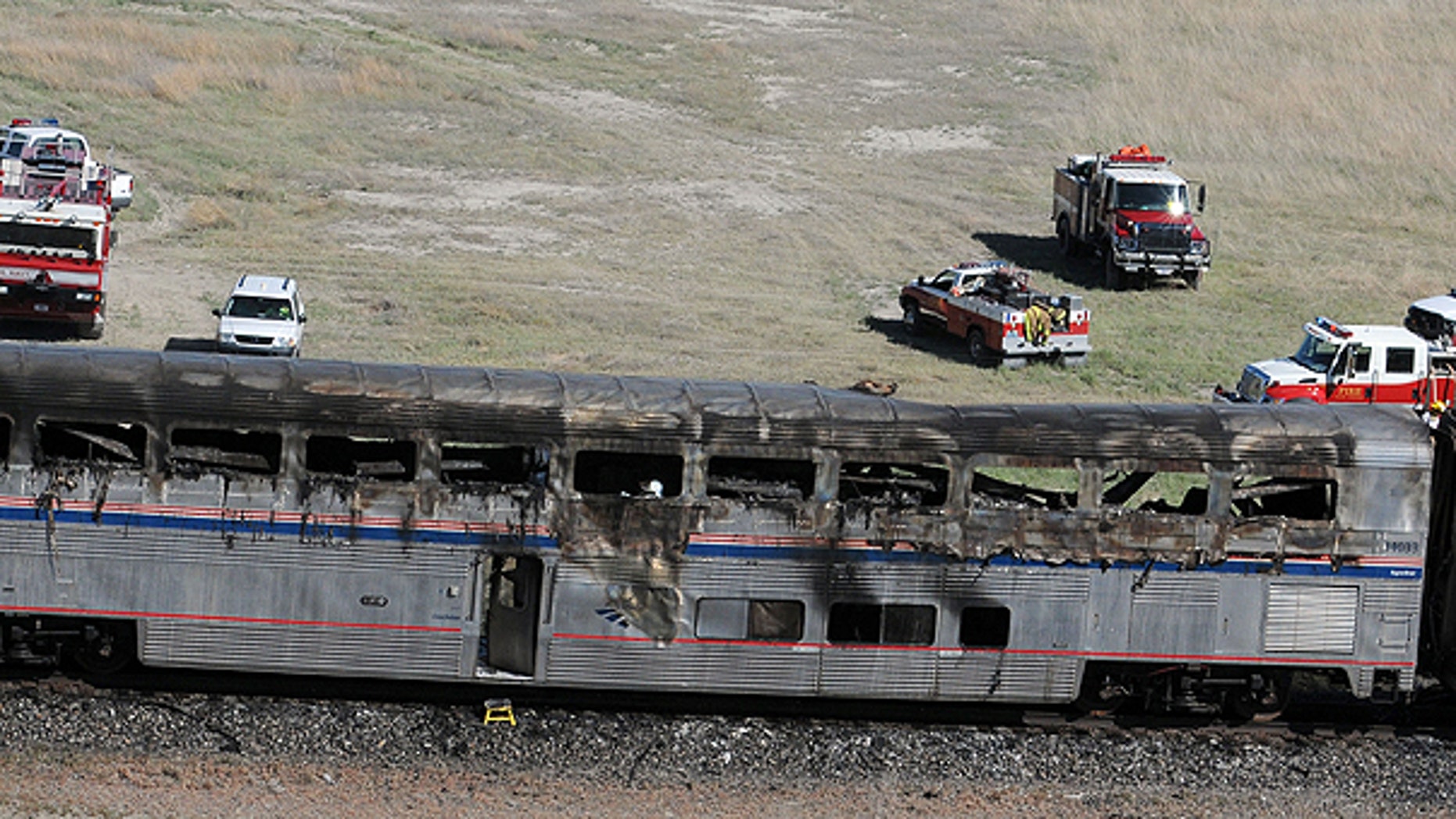 June 24: An Amtrak coach car is seen at the site of a collision between an Amtrak westbound train and a truck on U.S. 95 about 4 miles south of Interstate 80, 70 miles east of Reno, Nev.
