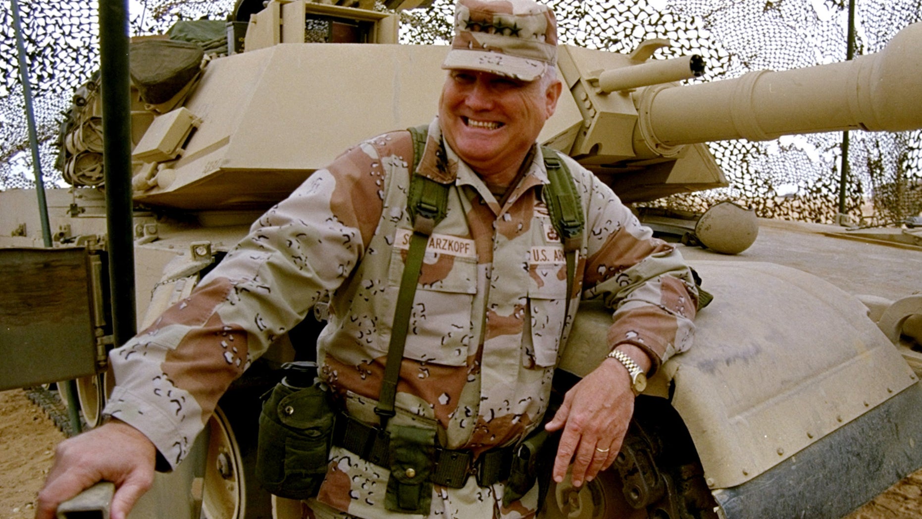 FILE - In this Jan. 12, 1991 file photo, Gen. H. Norman Schwarzkopf stands at ease with his tank troops during Operation Desert Storm in Saudi Arabia. Schwarzkopf died Thursday, Dec. 27, 2012 in Tampa, Fla. He was 78. (AP Photo/Bob Daugherty, File)
