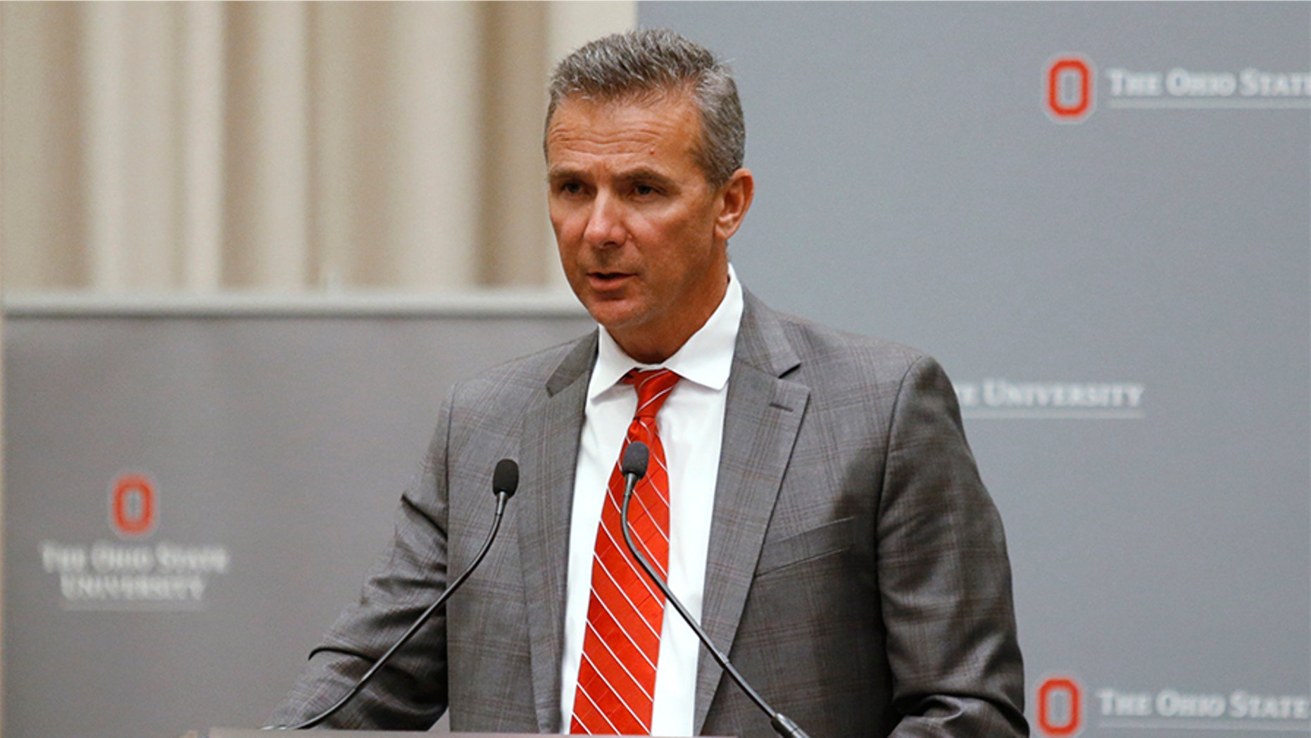 Ohio State University head football Urban Meyer apologized Friday to Courtney Smith, the ex-wife of his former assistant coach, and for his “lack of more action” regarding his handling of domestic abuse allegations.