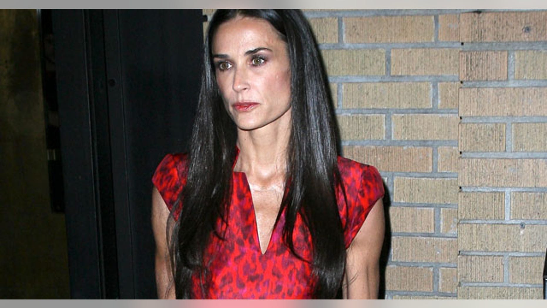 Demi Moore attends the 'Margin Call' premiere at the Landmark Sunshine Cinema on October 17, 2011 in New York City looking vacant, wearing her wedding ring and very thin. October 17, 2011. X17online.com