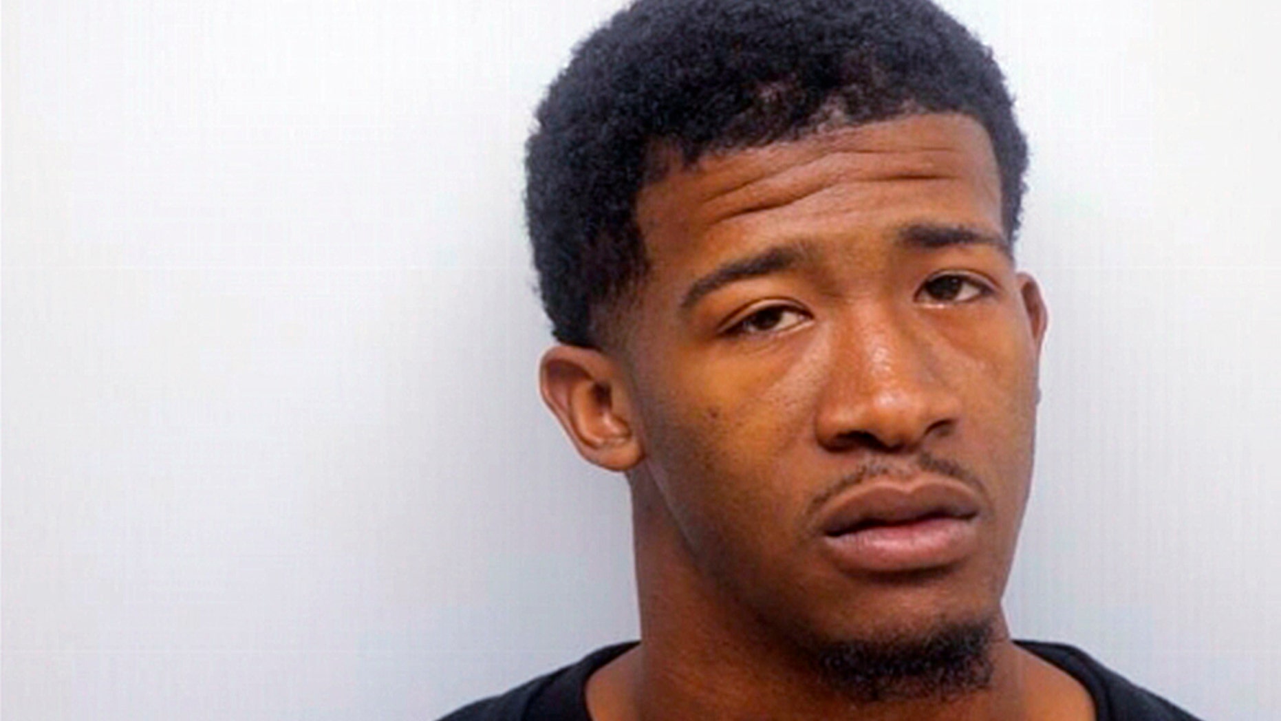 In this 2016 photo released by the Chatham County Sheriff Department, Patrick Mumford poses for a booking photo near Savannah, Ga. Mumford, wants police to apologize after officers shocked him with a Taser in a case of mistaken identity. Attorneys for Mumford and Savannah police both released body camera video showing officers ordering Mumford to get out of a parked car, saying they have an arrest warrant. Police charged Mumford with obstruction in the Feb. 1 incident, but dropped the charge in April. (Chatham County Sheriff Department via AP)