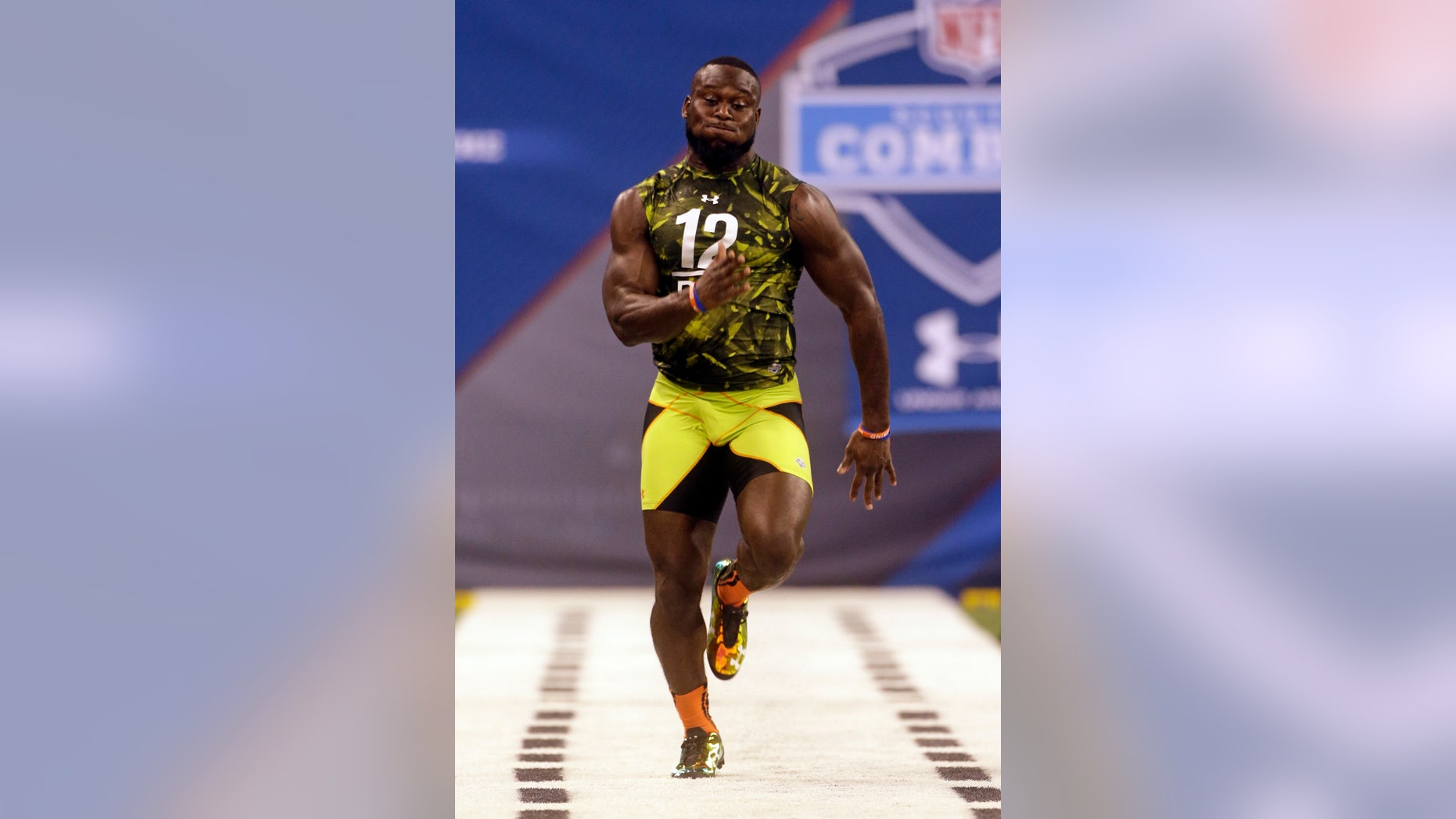 FILE - In this Feb. 26, 2013 file photo, Florida defensive back Matt Elam runs a drill during the NFL football scouting combine in Indianapolis. Baltimore Ravens general manager and executive vice president Ozzie Newsome hopes to fill out the team's roster this weekend by making the most of 12 draft picks. There’s a good chance the Ravens could select Elam. It’s even more difficult to guess what will occur in the later rounds. (AP Photo/Dave Martin)