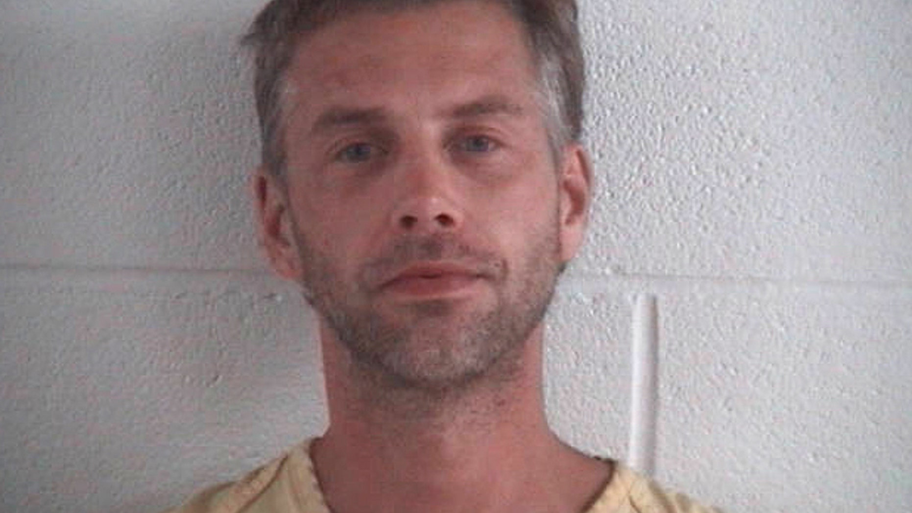 This photo provided by Ashland County Sheriff Office shows Shawn M. Grate. Grate, was arrested Tuesday, Sept. 13, 2016, in Ashland, Ohio in connection to the investigation of a rescued abductee and the discovery of the remains of two people in the home where he was arrested. (Ashland County Sheriff Office /The Times Gazette via AP)