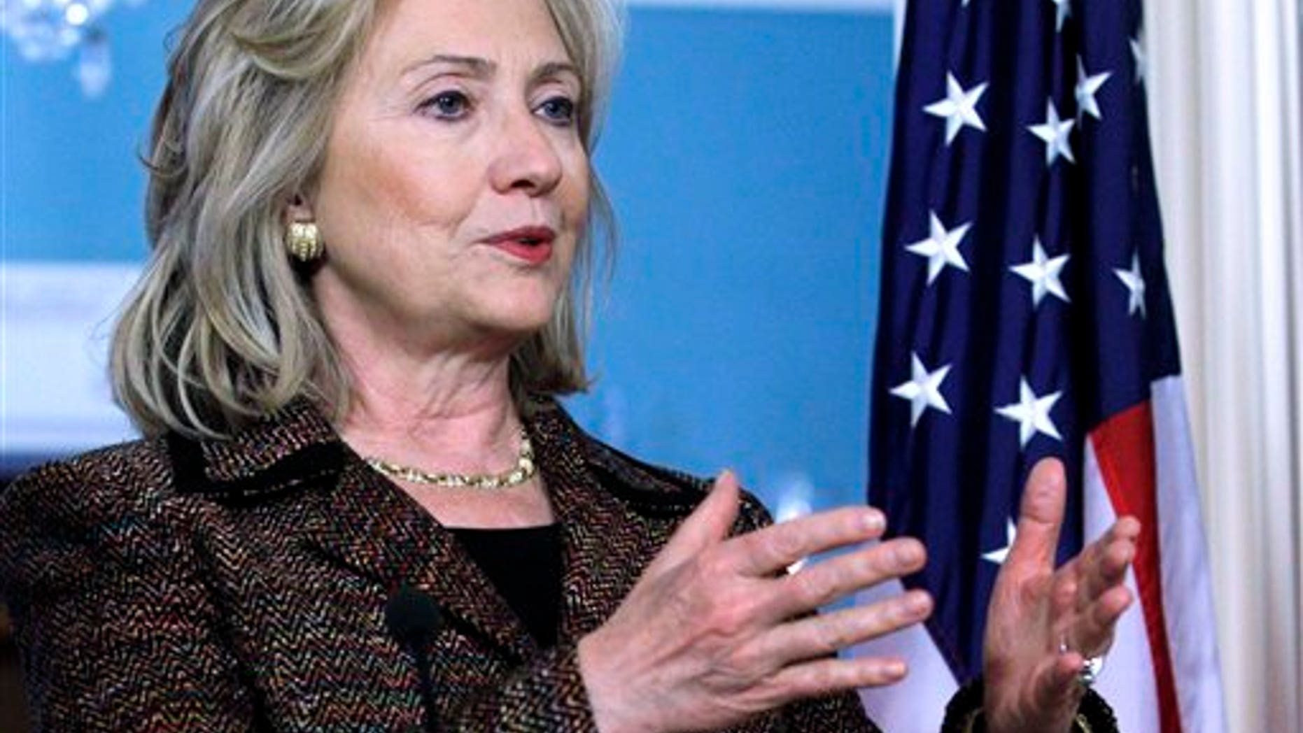 June 2: Secretary of State Hillary Rodham Clinton, accompanied by Czech Foreign Minister Karel Schwarzberg, not shown gestures during their joint news confernece at the State Department in Washington. (AP)