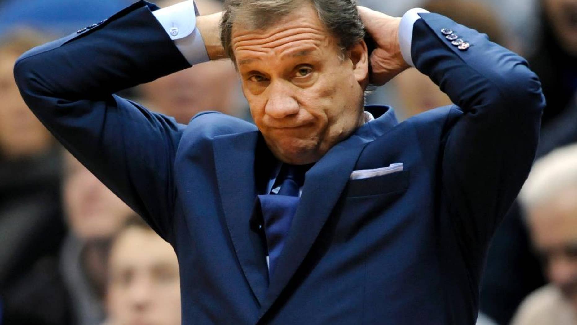 Minnesota Timberwolves head coach Flip Saunders watches during the second quarter of an NBA basketball game against the Philadelphia 76ers Wednesday, Dec. 3, 2014, in Minneapolis. (AP Photo/Hannah Foslien)