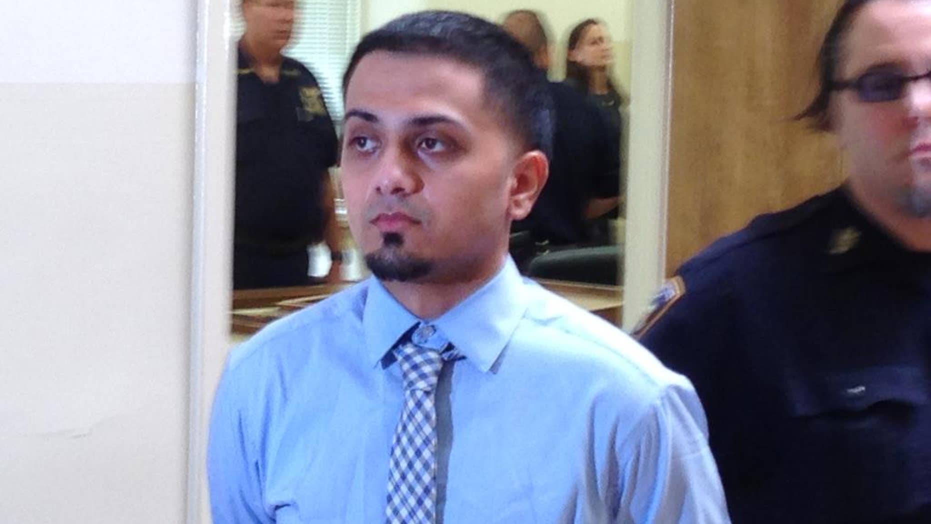 FILE - In this Tuesday, July 29, 2014, file photo, Joseph Beer is escorted from the courtroom in Mineola, N.Y., where he reached a plea deal. Beer, a New York City teenager who admitted smoking marijuana and speeding before crashing into a tree in 2012, killing four of his friends, is due to be sentenced in a Long Island courtroom. (AP Photo/Frank Eltman, File)