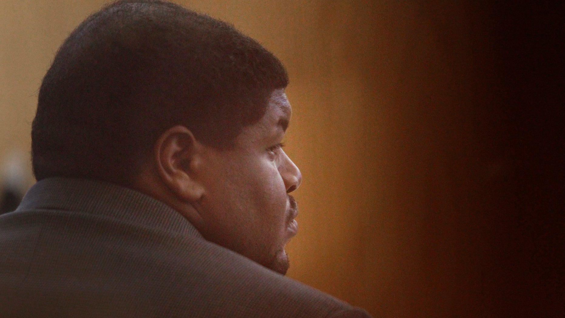 Josh Brent, a former Dallas Cowboys player, listens a witness testifies during his trial at the Frank Crowley Courts building in Dallas, Monday, Jan. 13, 2014. Brent is charged with intoxication manslaughter in the December 2012 death of his friend and former college teammate, Jerry Brown, in a December 2012 crash. (AP Photo/The Dallas Morning News, Kye R. Lee)