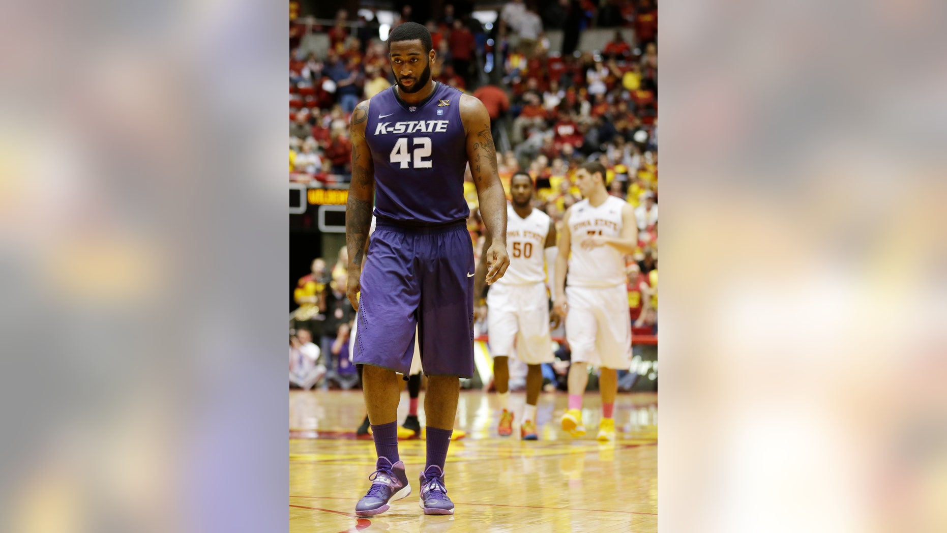 Kansas State forward Thomas Gipson (42) walks up court during the second half of an NCAA college basketball game against Iowa State, Saturday, Jan. 25, 2014, in Ames, Iowa. Iowa State won 81-75. (AP Photo/Charlie Neibergall)