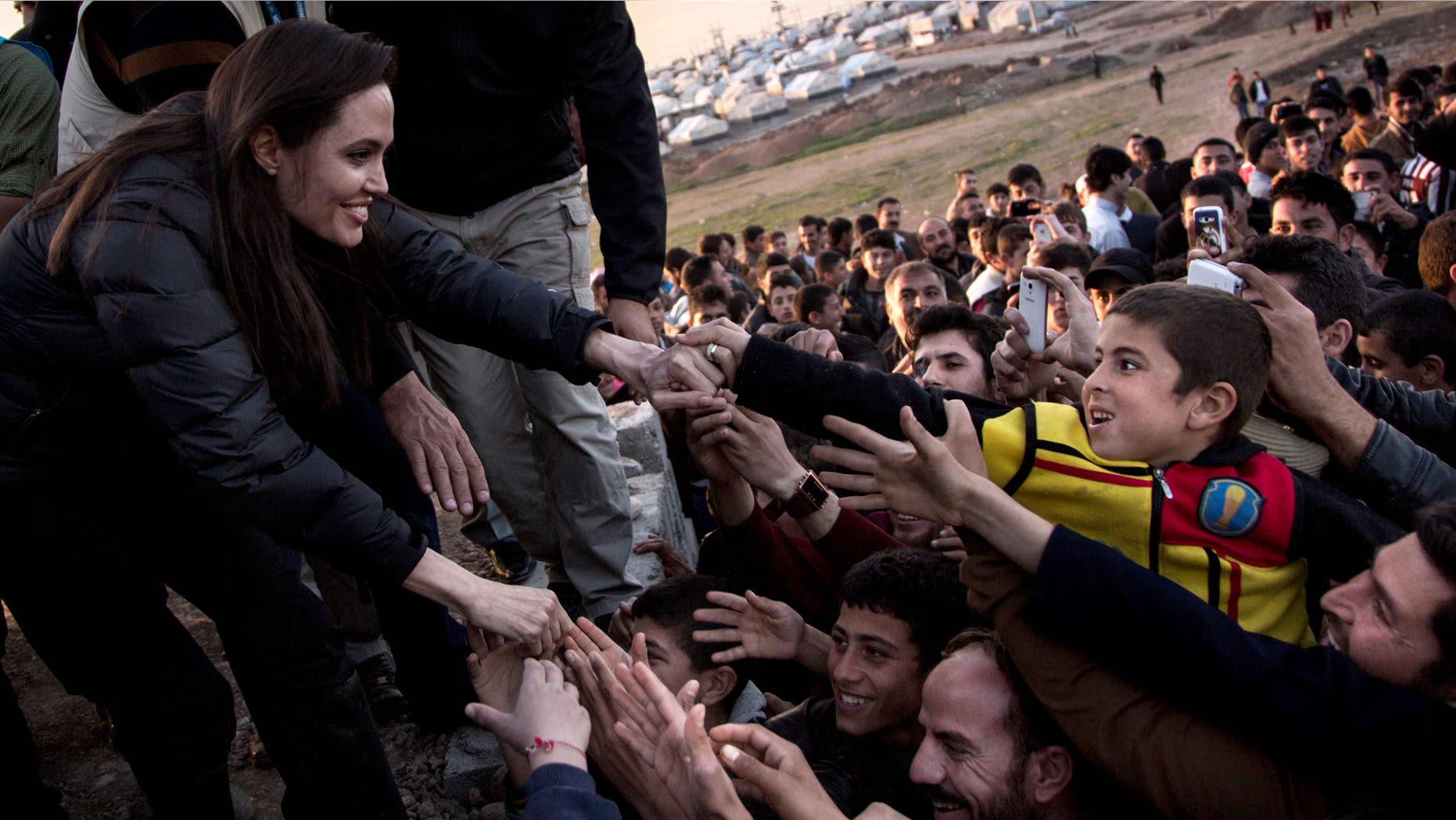 Angelina Jolie meets members of the Yazidi minority in Khanke IDP Camp on January 25, 2015 in Khanke, Iraq.