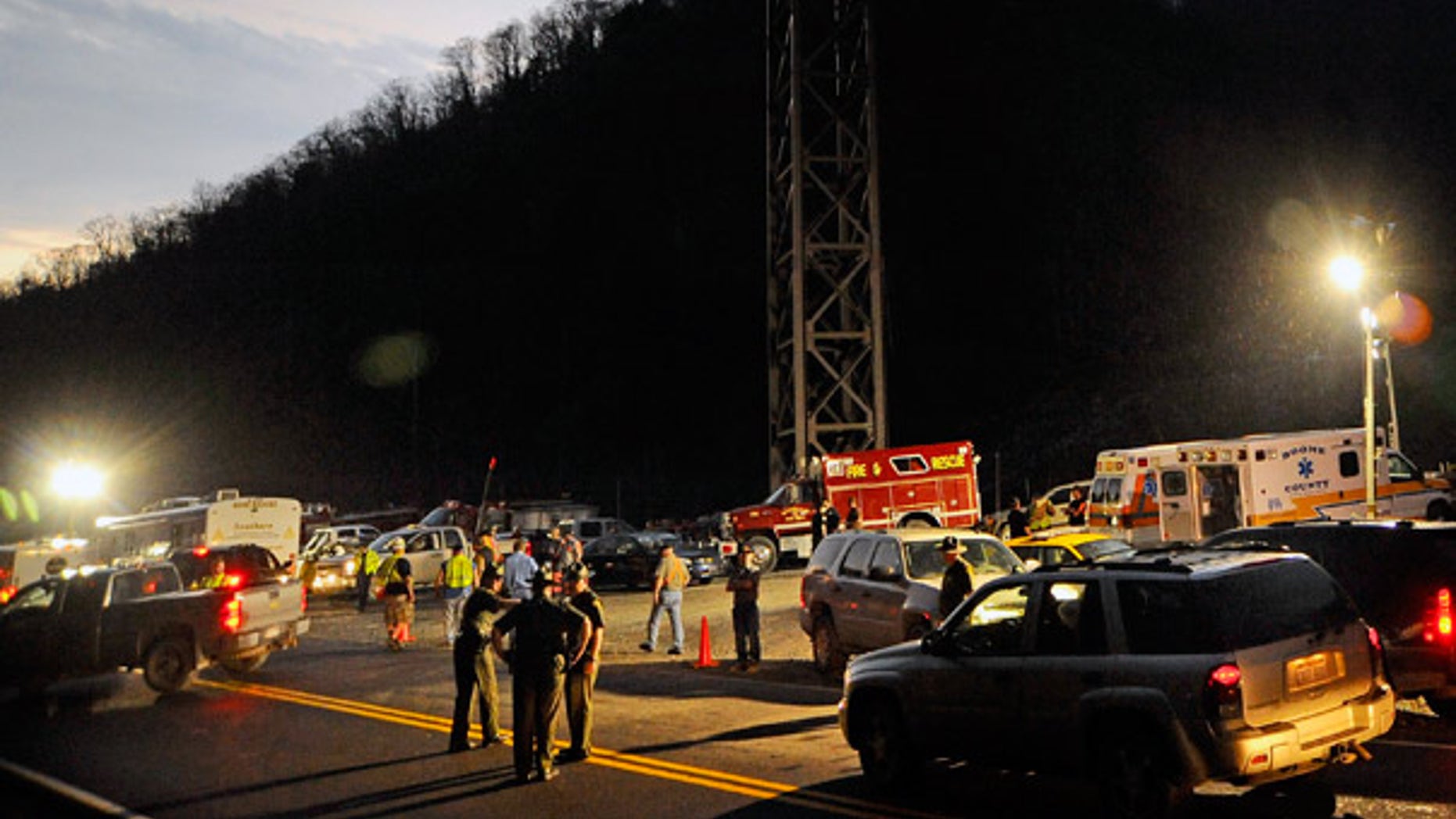 Apr. 4: West Virginia State Police direct traffic at the entrance to Massey Energy's Upper Big Branch Coal Mine in Montcoal.