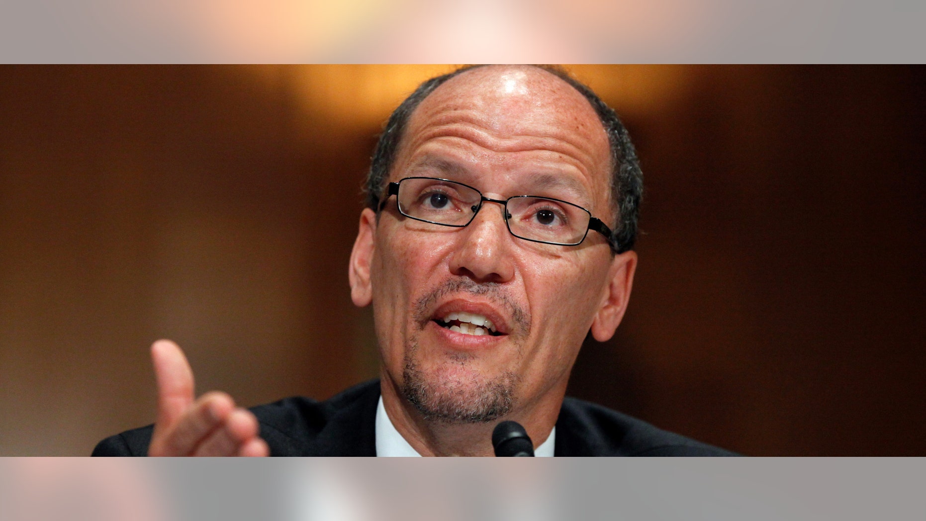 Labor Secretary nominee Thomas Perez testifies on Capitol Hill in Washington.