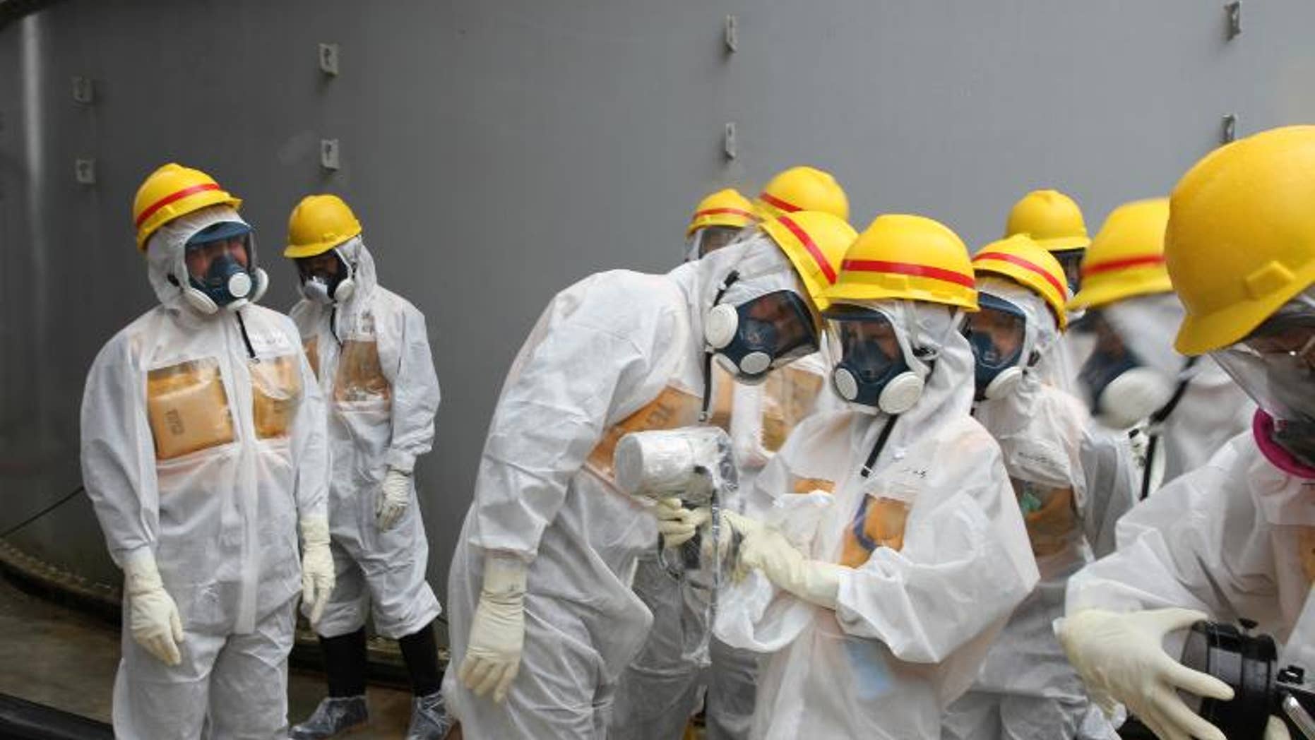 Workers at Japan's crippled Fukushima nuclear plant Thursday spotted a hole in one of the barriers intended to keep radioactive particles contained in the harbour, the operator said.