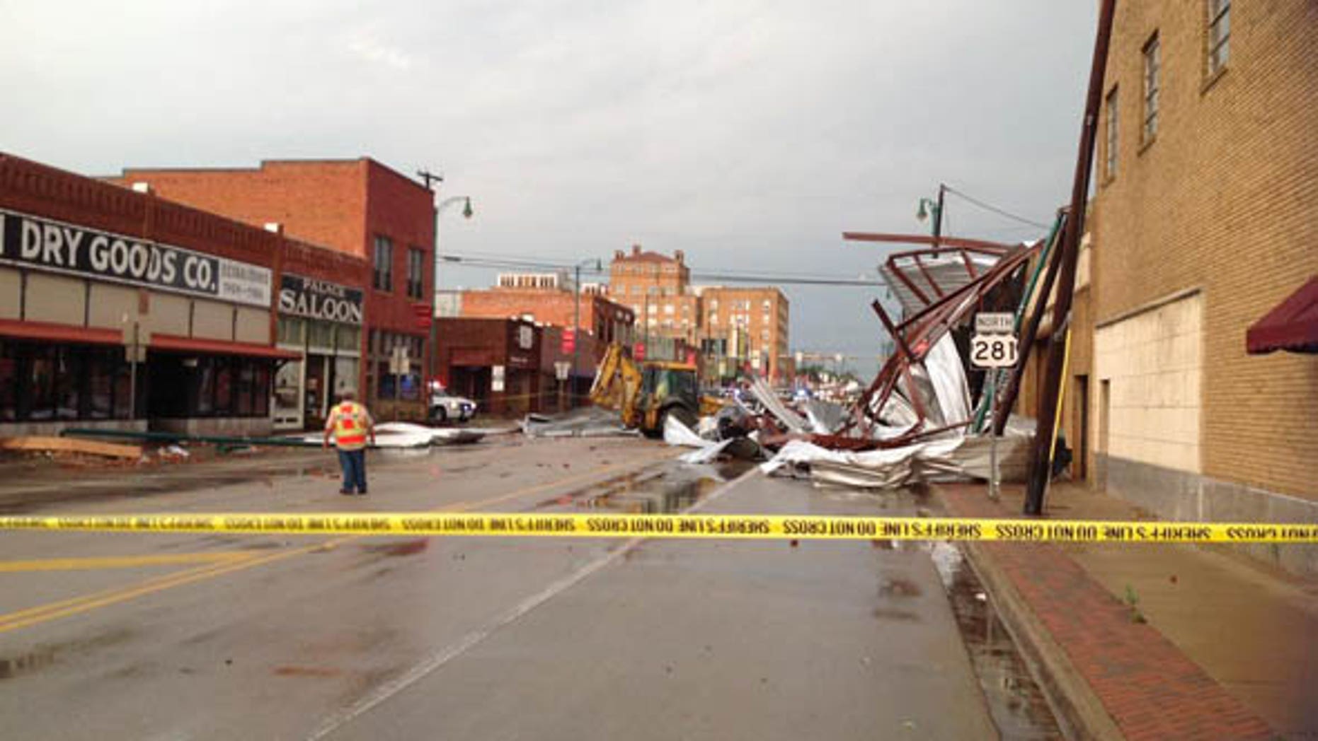 May 19, 2015: Emergency workers survey the damage after a tornado struck Mineral Falls, Texas. (Fox4News.com)