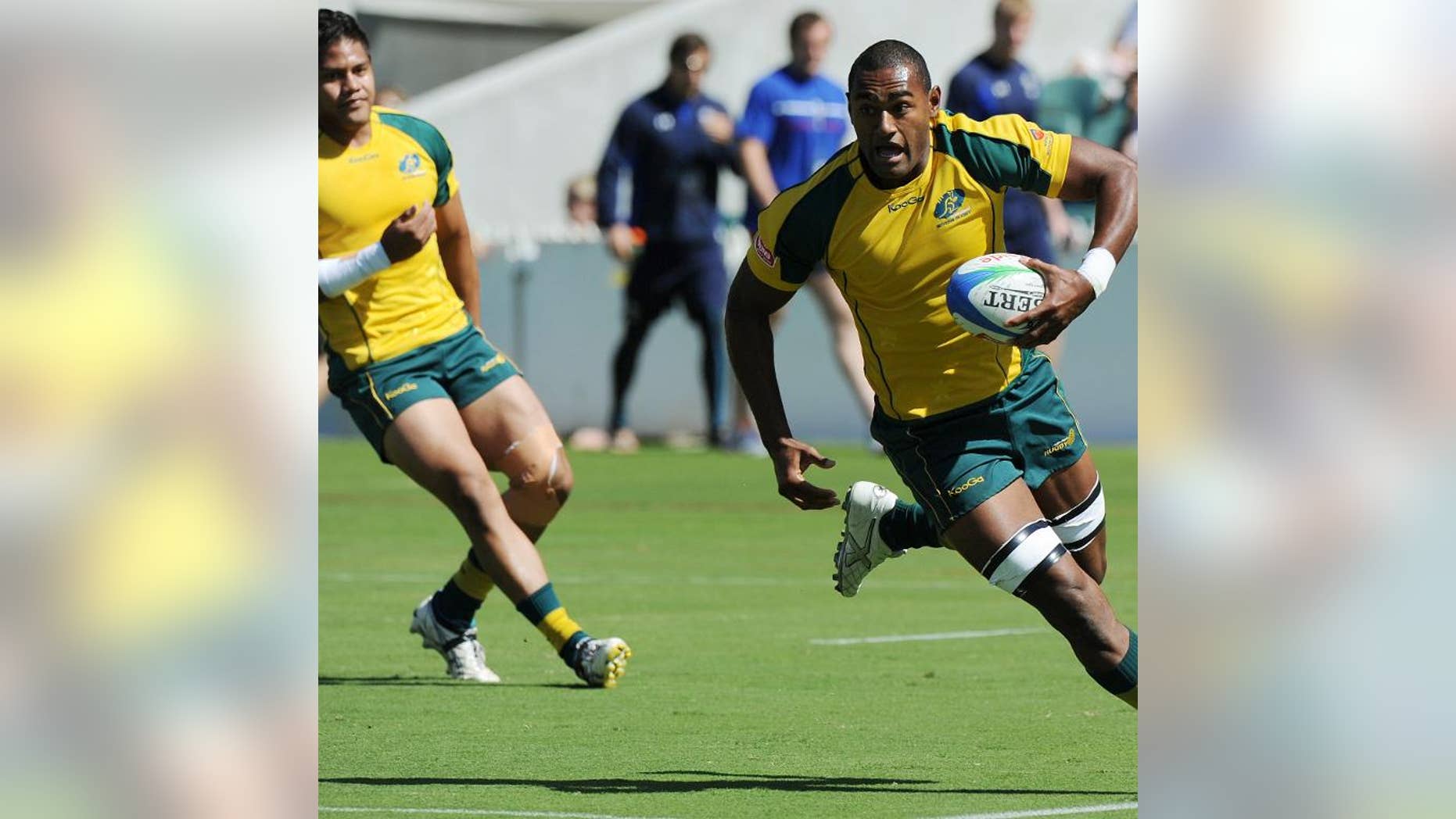 Tevita Kuridrani of Australia (right)in Adelaide on April 2, 2011