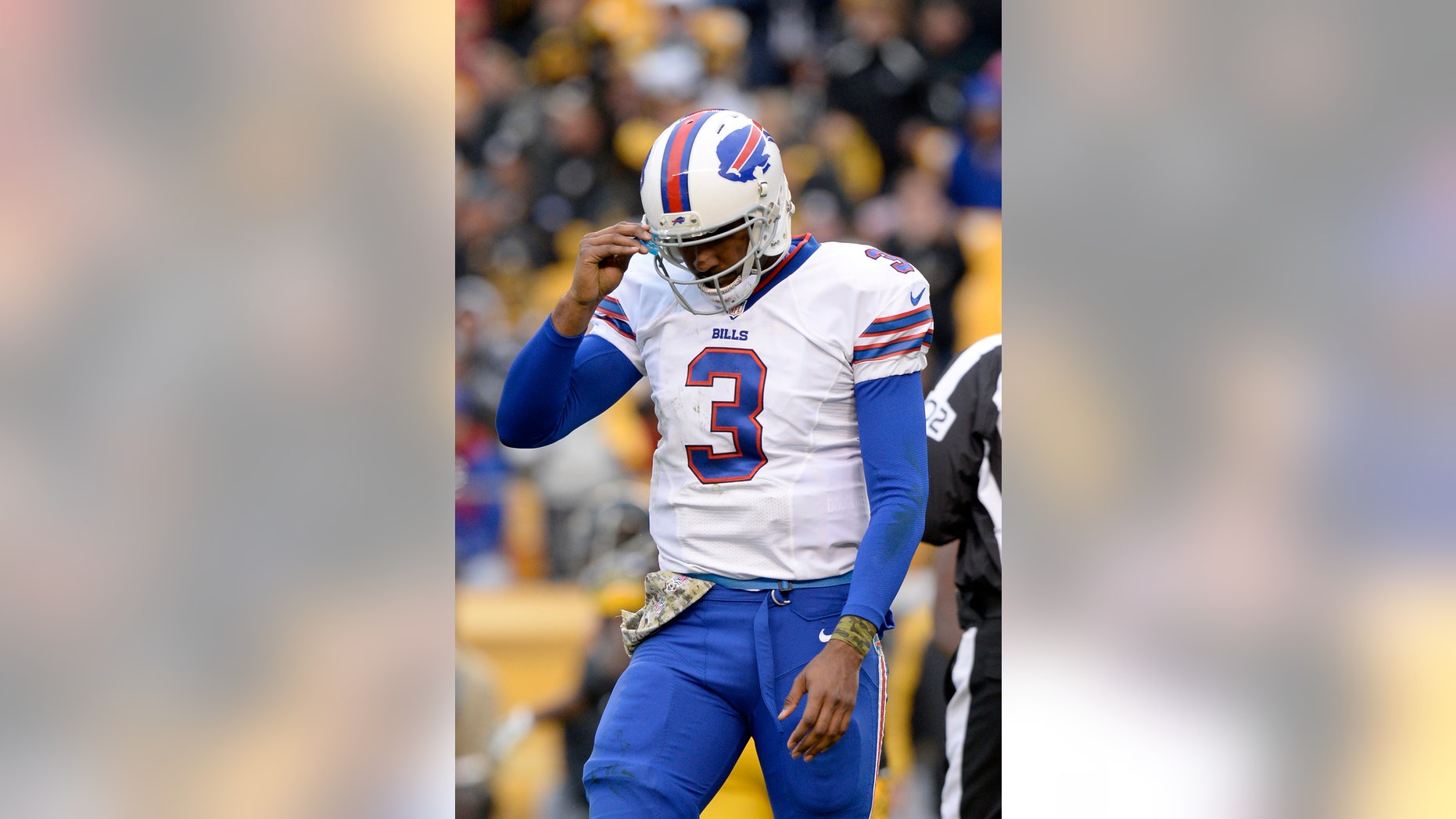 Buffalo Bills' EJ Manuel walks off the field after being tackled during the second half of an NFL football game against the Pittsburgh Steelers, Sunday, Nov. 10, 2013, in Pittsburgh. (AP Photo/Don Wright)