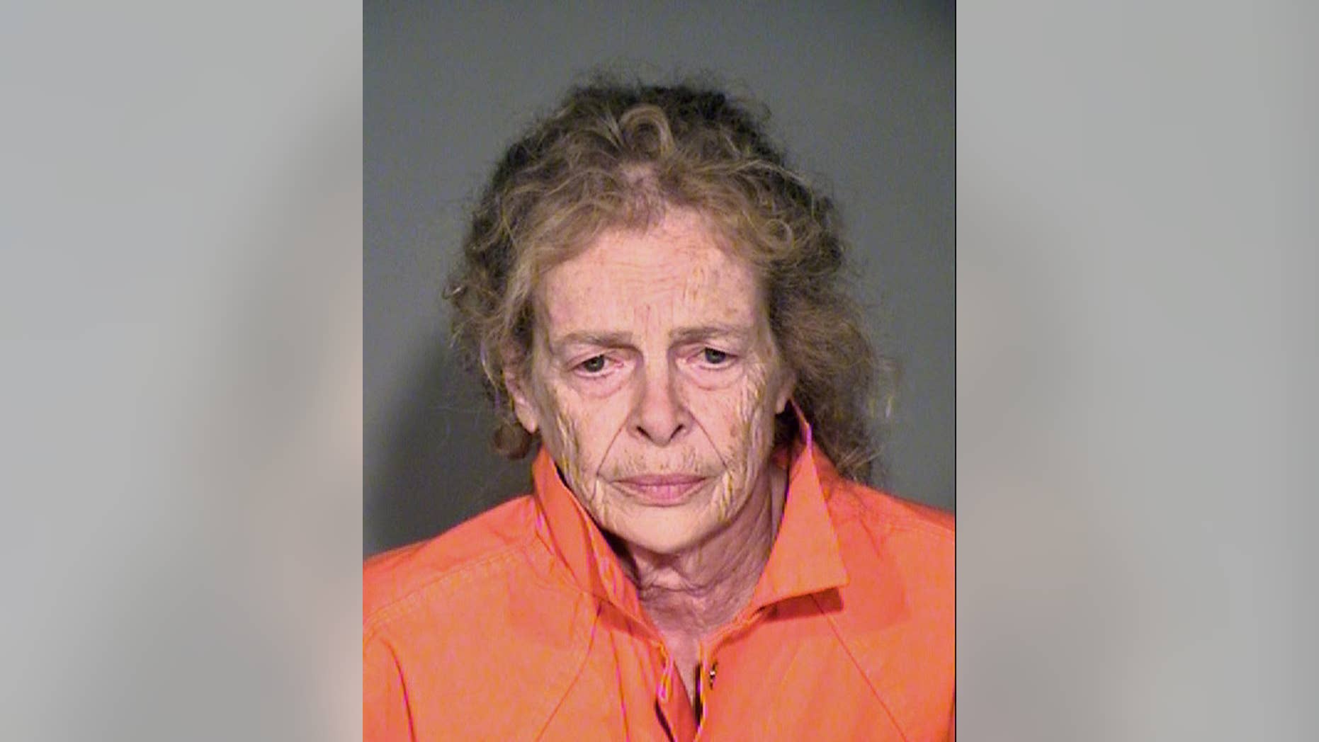 This Sunday, July 17, 2016, photo provided by the Simi Valley, Calif., Police Department shows Mary Karacas, 75. Karacas was arrested for investigation of murder after her 83-year-old boyfriend was found dead in their home Simi Valley home Sunday. The body of Salvatore Orefice was discovered in a bed Sunday by a man who had bought the house in Simi Valley from the couple in June, and stopped by to check their progress with moving out. (Simi Valley Police Department via AP)