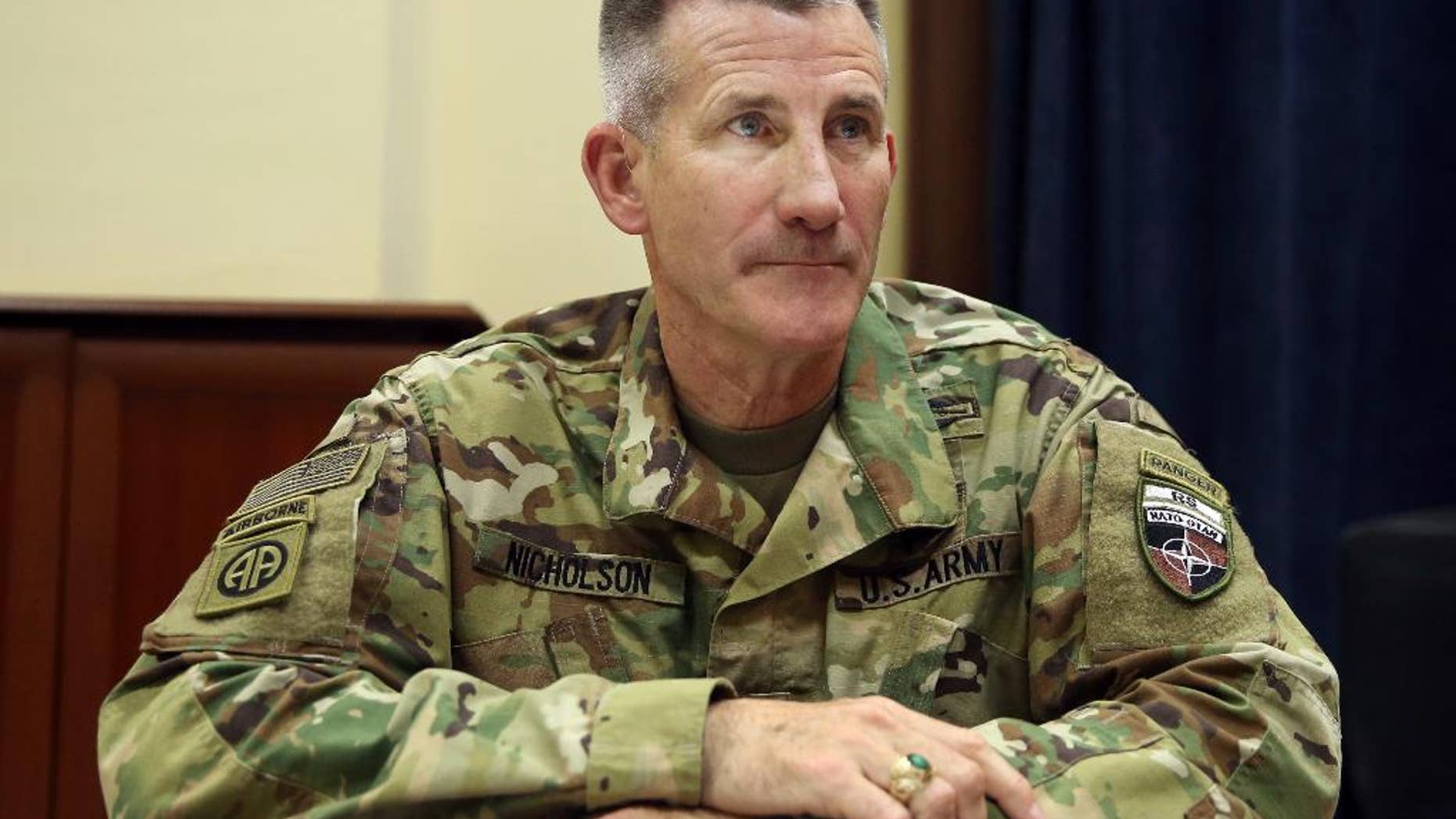 FILE - In this July 27, 2016 file photo, U.S. Army Gen. John Nicholson is interviewed by The Associated Press at his office in Kabul, Afghanistan. The Taliban have control over 10 percent of Afghanistan’s population and the insurgent group is battling with the Afghan government for control of at least another 20 percent, the top U.S. commander in Afghanistan said Friday, Sept. 23, 2016, describing a tough fight that is costing a high level of Afghan casualties. Nicholson said many of the Afghan deaths are in battles over checkpoints, where there are often a small number of forces who are poorly led, ill-equipped and not well trained. (AP Photo/Massoud Hossaini, File)