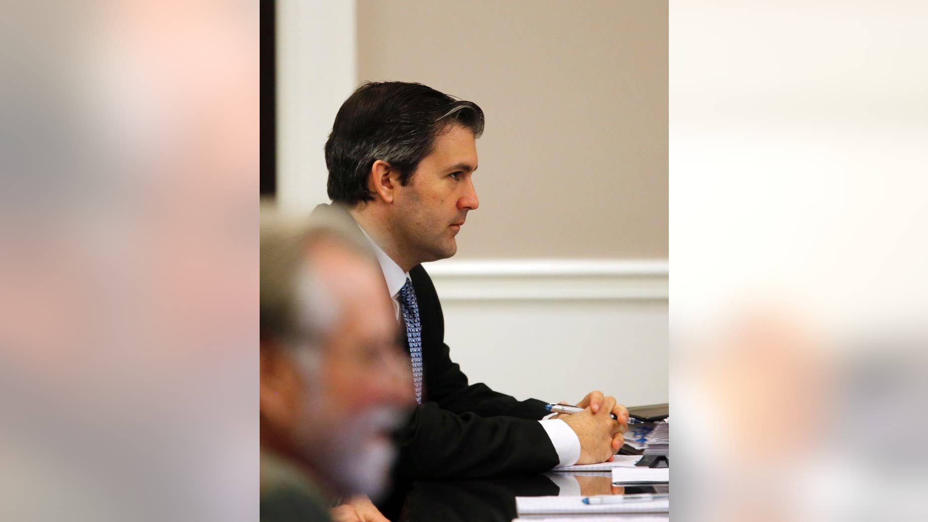 Former North Charleston police officer Michael Slager, listens to testimony at his trial at the Charleston County court in Charleston, S.C., Wednesday, Nov. 16, 2016. Slager is charged in the shooting death of Michael Scott, an unarmed black motorist. (Grace Beahm/Post and Courier via AP, Pool)