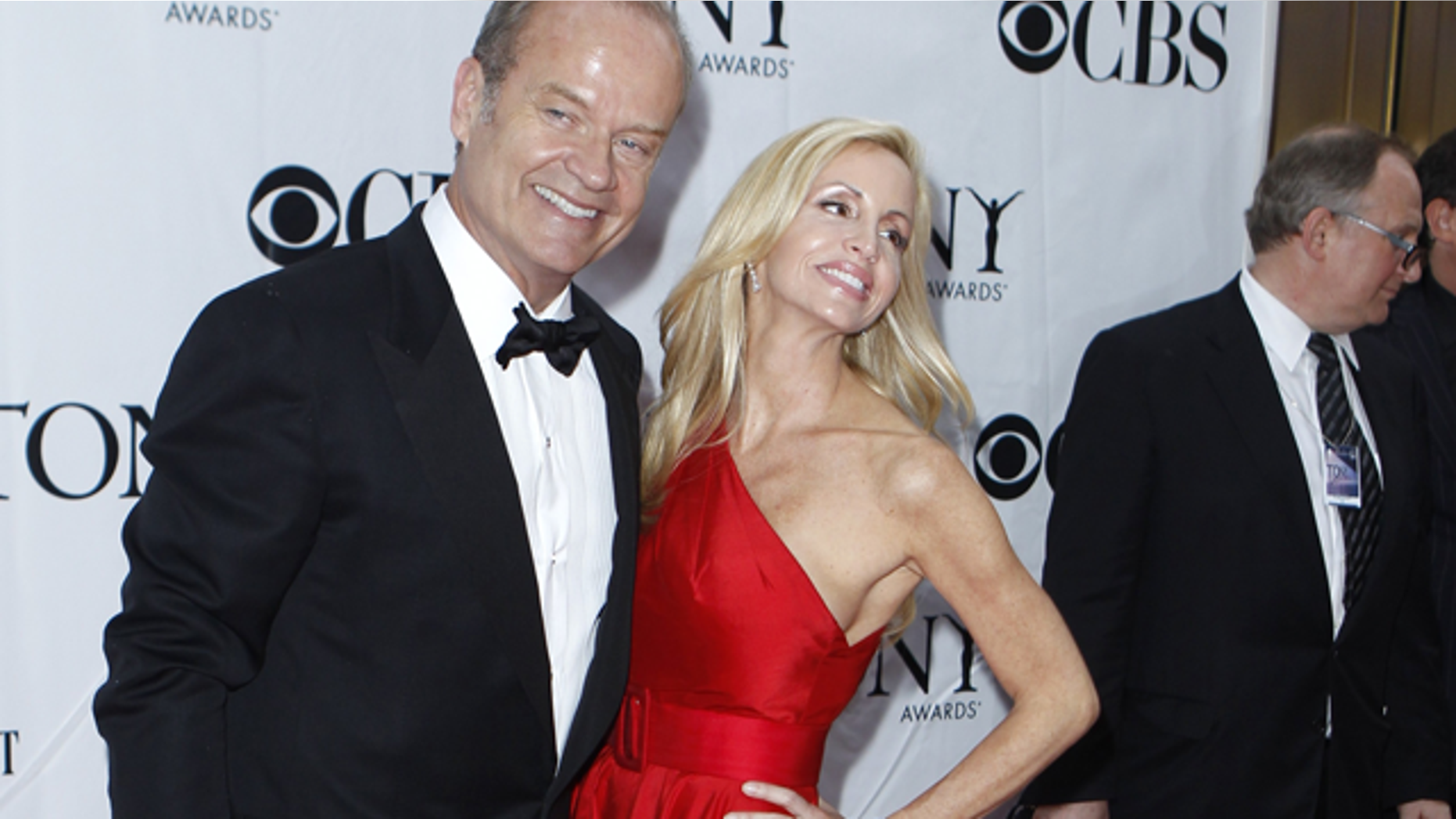 Kelsey grammer and his estranged wife Camille in New York on June 13, 2010. (Reuters)