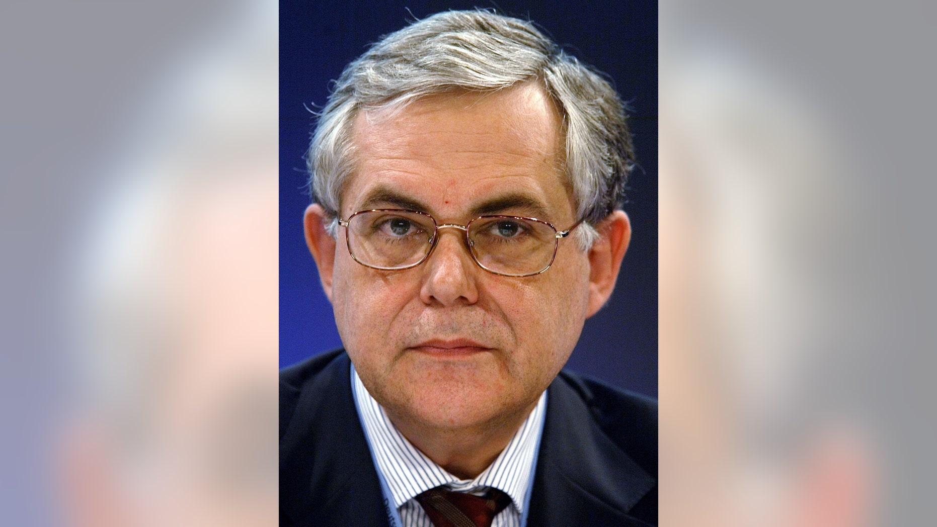 Lucas Papademos, former European Central Bank (ECB) Vice President attends a news conference about the results of the ECB-meeting in Berlin.
