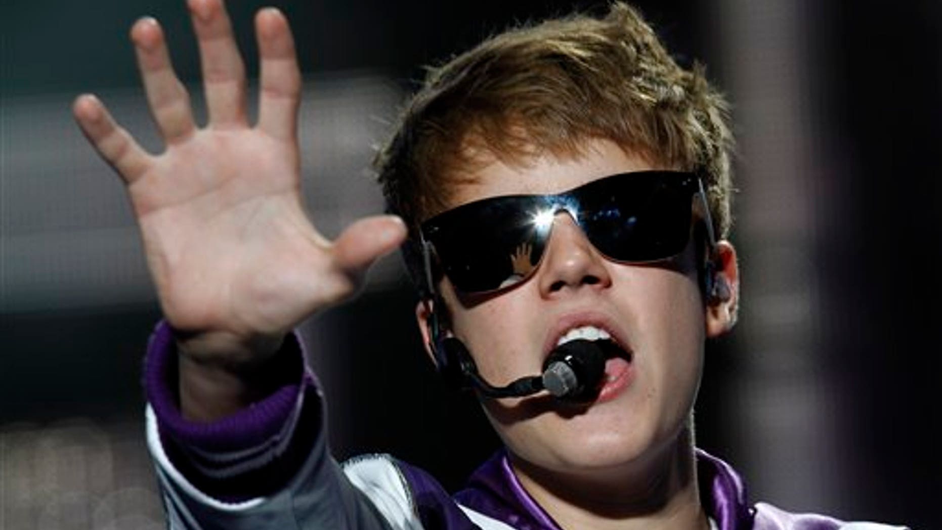 Pop sensation Justin Bieber performs during his "My World Tour" concert at Foro Sol in Mexico City, Saturday Oct. 1, 2011. (AP Photo/Marco Ugarte)