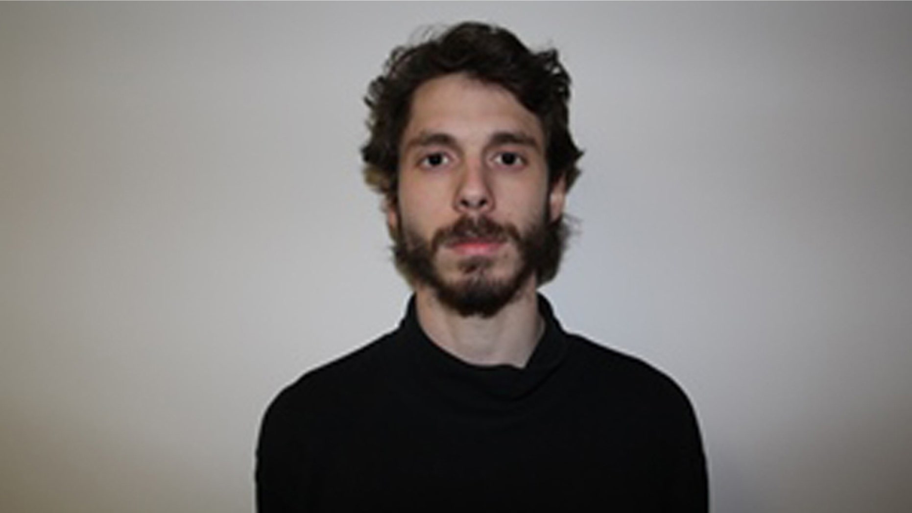 This image provided by the Middletown Police Department shows Eric Lonergan of Rio de Janeiro. Lonergan is accused of possessing a controlled substance and illegally obtaining or supplying drugs. Lonergan was one of four Wesleyan University students arrested Tuesday Feb. 24, 2015 in connection with about a dozen hospitalizations among people who took a party drug known as Molly. (AP Photo/Middletown Police Department)