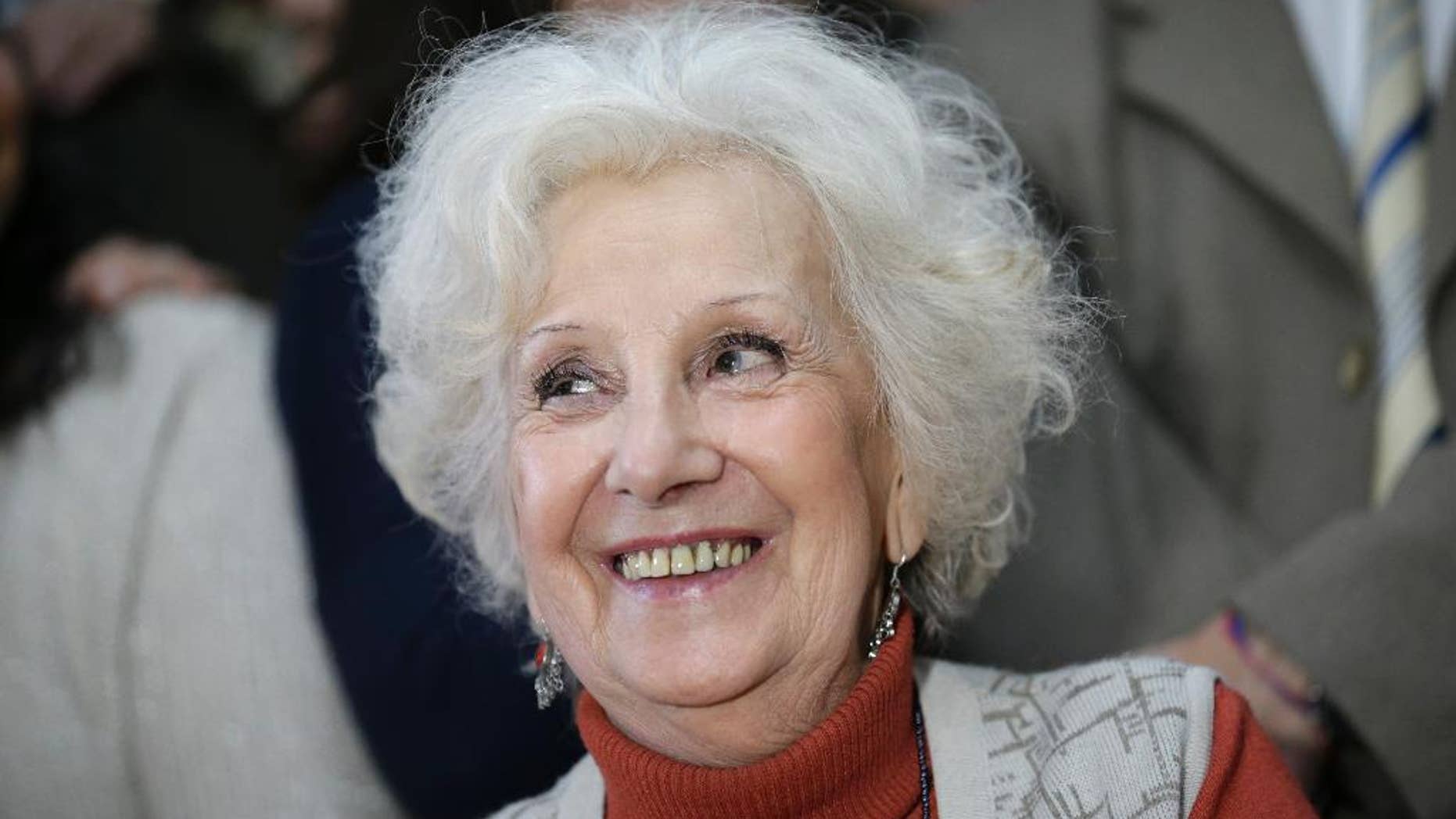 Estela de Carlotto, president of Grandmothers of Plaza de Mayo smiles during a news conference in Buenos Aires, Argentina, Tuesday, August 5, 2014. Carlotto, one of the most prominent human rights activists in Argentina, has located the grandson born to her daughter Laura in captivity during the military dictatorship that ruled Argentina from 1976-1983. Laura was kidnapped and killed by the military in August 1978. (AP Photo/Victor R. Caivano)