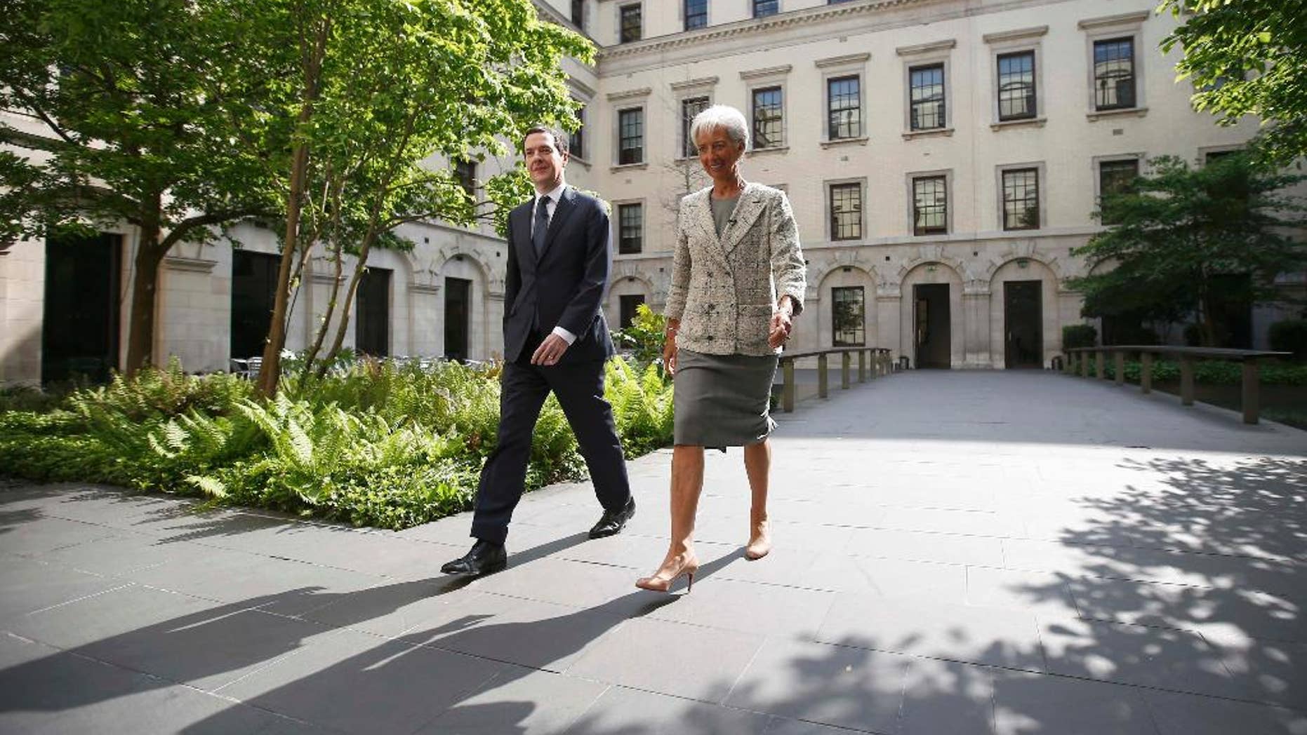 Managing Director of the International Monetary Fund Christine Lagarde meets with Britain's Chancellor George Osborne, prior to a press conference, in London, Friday, May 13, 2016. London's status as a global financial center could be eroded should Britain vote to leave the European Union in a June 23 referendum, the International Monetary Fund warned Friday. (Peter Nicholls/Pool photo via AP)