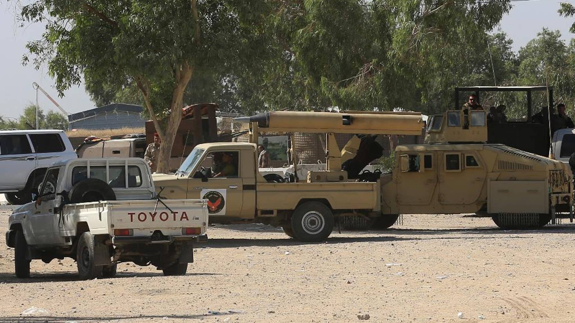 May 29, 2016: Iraqi security forces, with allied Shiite Popular Mobilization Forces and Sunni tribal fighters, gather outside Fallujah, Iraq,