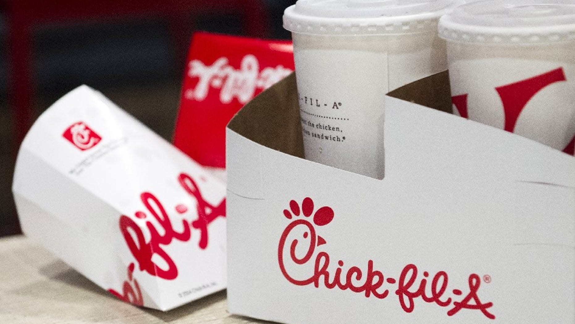 FILE -- Drink and sandwich containers are seen on a customer's table of a Chick-fil-A restaurant.