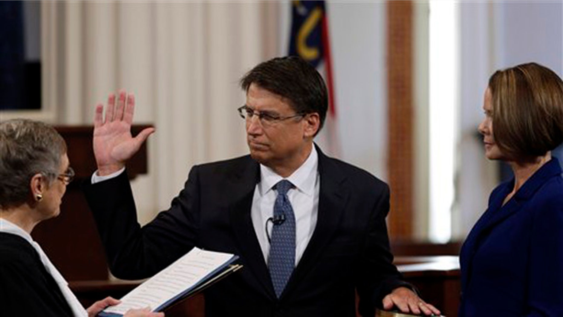 FILE: Jan. 5, 2013: Then-Gov.-elect Pat McCrory is sworn in as North Carolina governor in the House chamber of the old Capitol building in Raleigh, N.C.