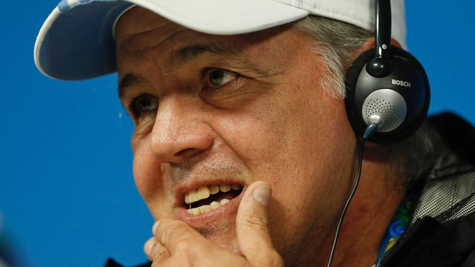 Argentina's head coach Alejandro Sabella listens to a question during a news conference at Itaquerao Stadium in Sao Paulo, Brazil, Monday, June 30, 2014. Argentina will face Switzerland in their next World Cup soccer match, Tuesday. (AP Photo/Victor R. Caivano)